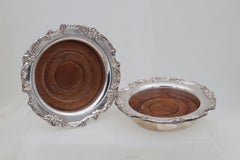 Pair of Reed and Barton silver plated wine bottle coasters