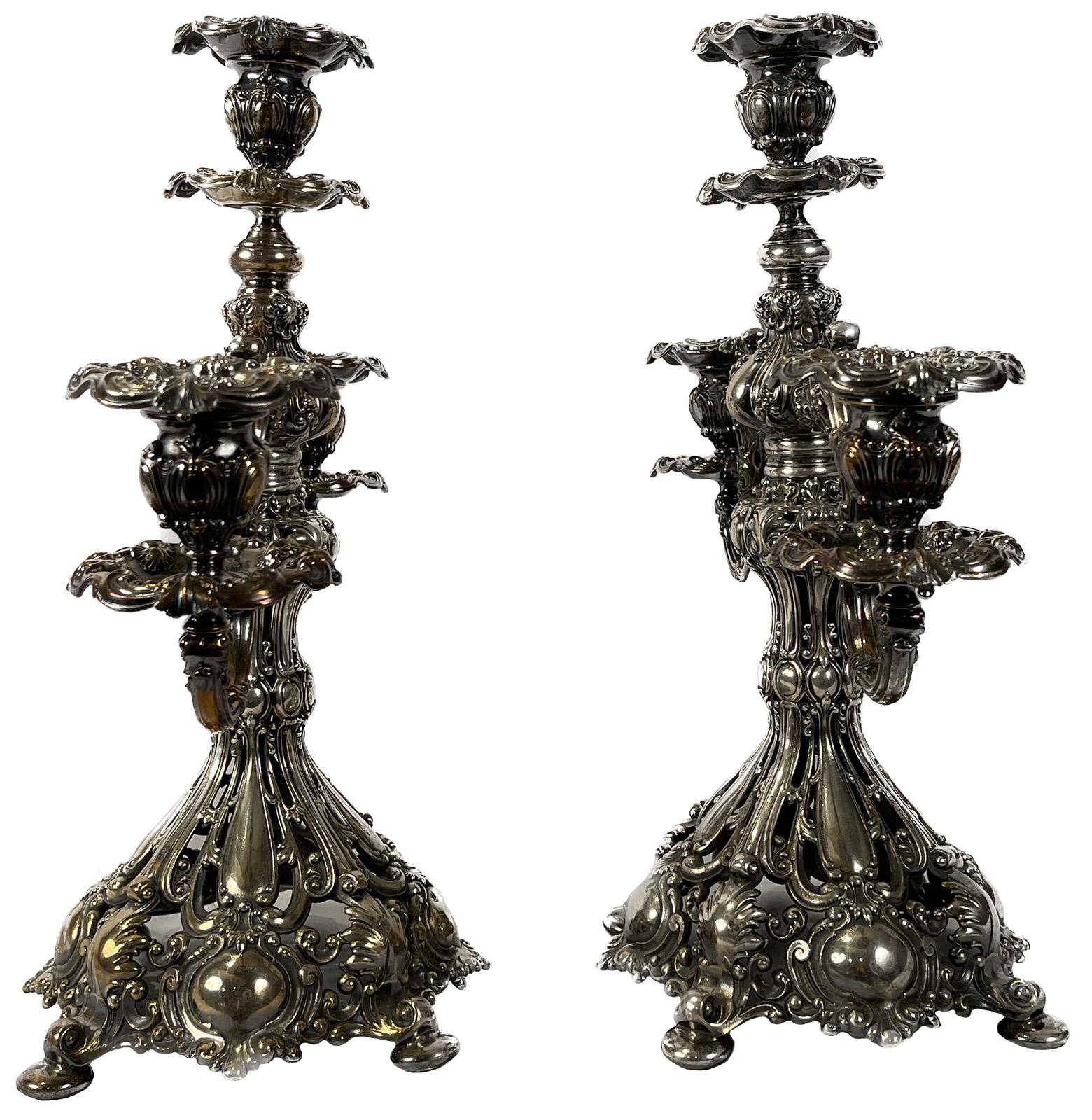 A pair of mid-20th century silver-plated candelabras from Reed & Barton

Dimensions: 16