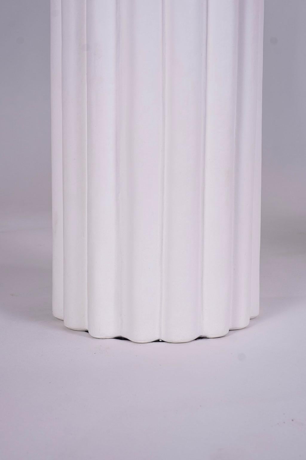 Reeded-shape white plaster lamp, by Liz Marsh. Wired for use within the USA using UL listed parts. Includes complimentary black painted paper shades (listed measurements include shade - without shade height is 20.25 inches and diameter is 7.5