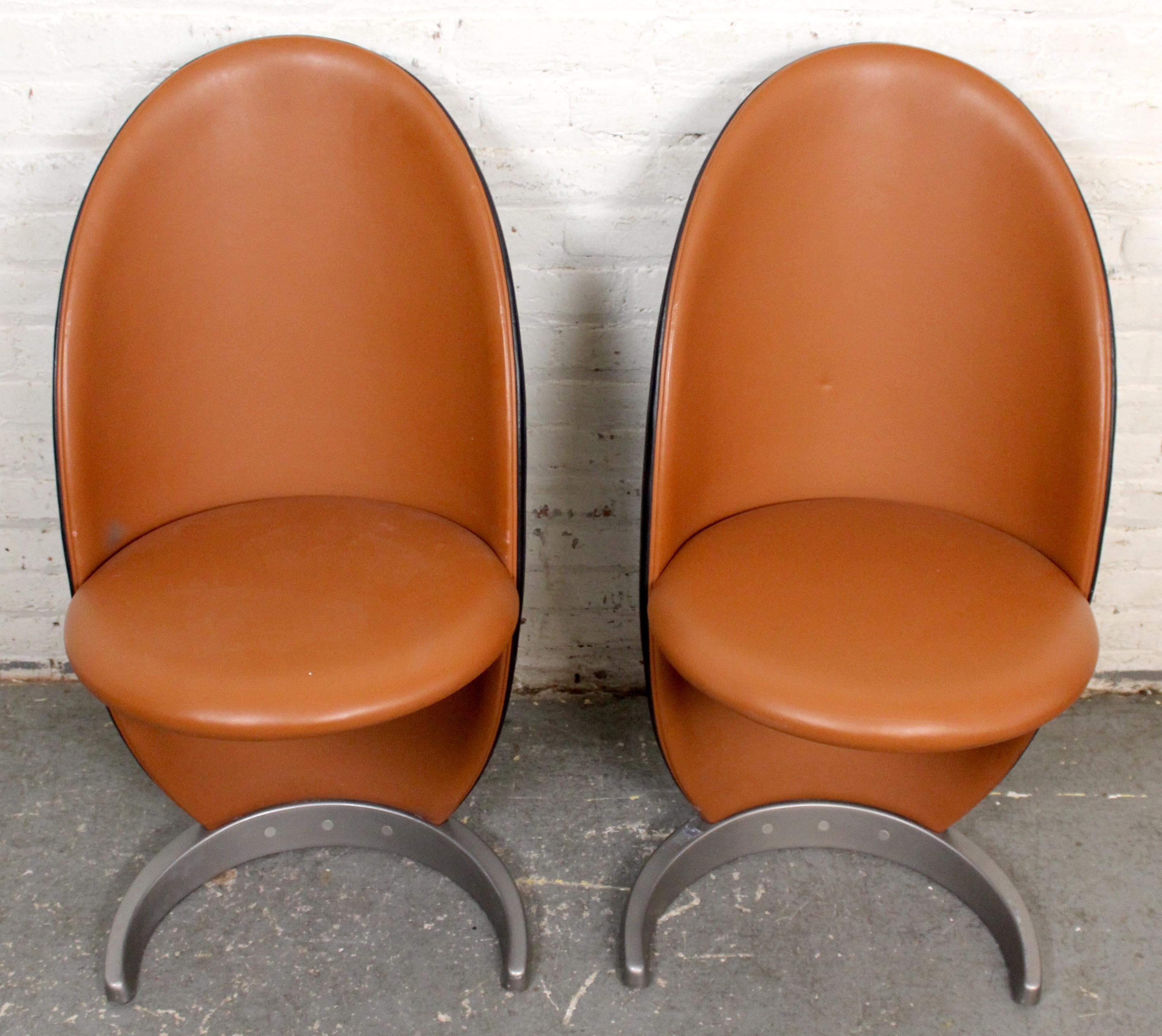 Terrifically funky two-tone office chairs designed by Tulczinsky for Italy's Relflex brand. With a unique asymmetrical cantilevered design, the popular 