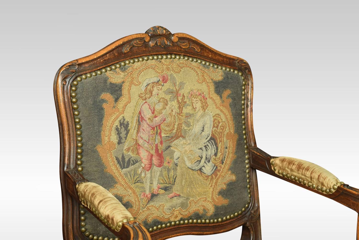 Pair of Regence style fruitwood fauteuil, each with an arched and padded back joined by molded acanthine-carved arms to the padded seat, raised above a carved apron on cabriole legs joined by a shaped X-form stretcher and ending in foliated toes,