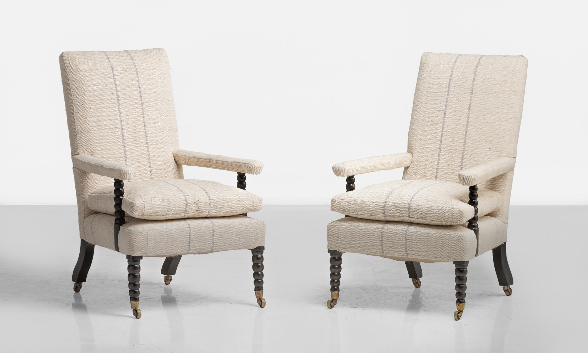 Pair of Regency armchairs, circa 1820

Newly upholstered in a cotton herringbone with hand-turned supports and brass hardware.