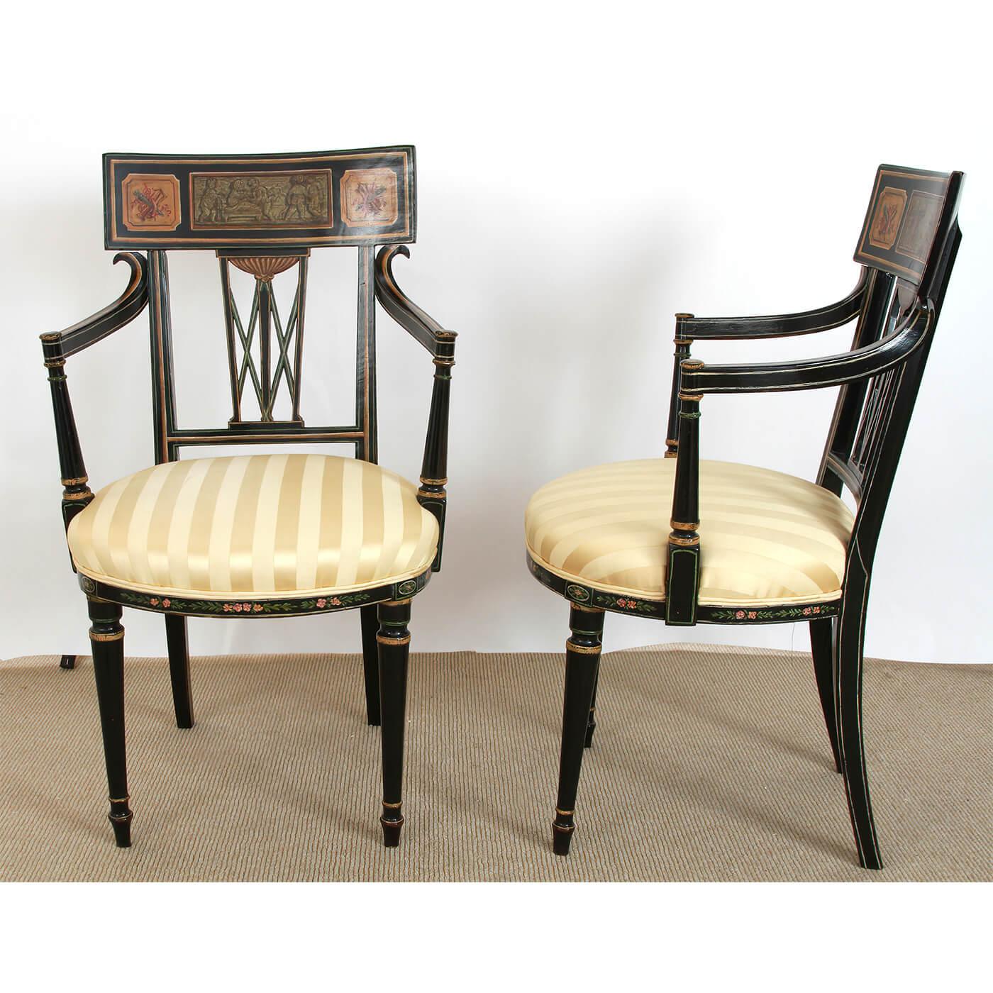 A Fine Pair of English Regency ebonized armchairs with classic painted panel splats with matching motifs and gilt decorations. Ca 1810

Dimensions: 21