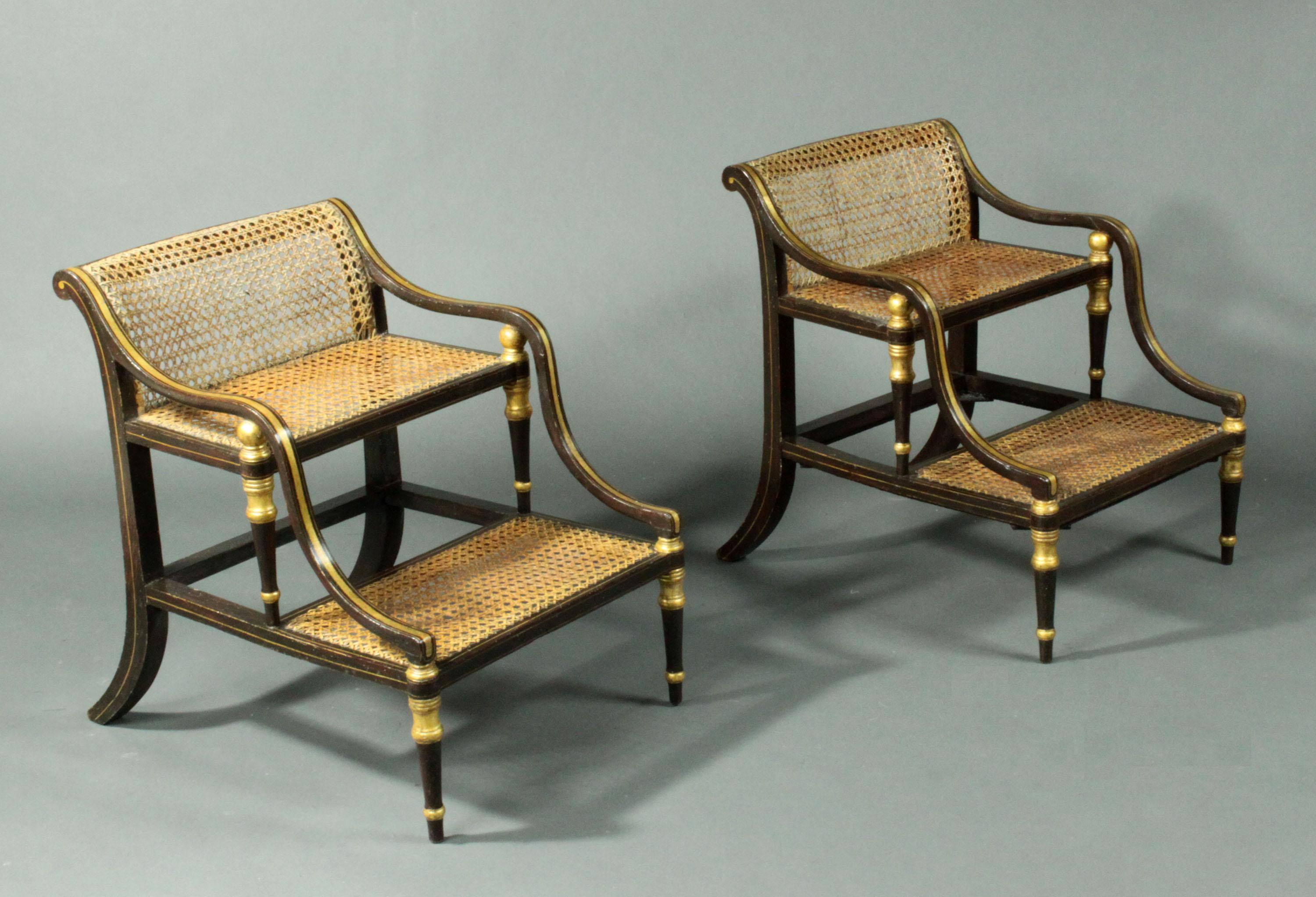 A rare and elegant pair of Regency simulated rosewood bedsteps; could be used as interesting occasional tables in a drawing room. The green striped cushions are covered in hard-wearing horsehair fabric.