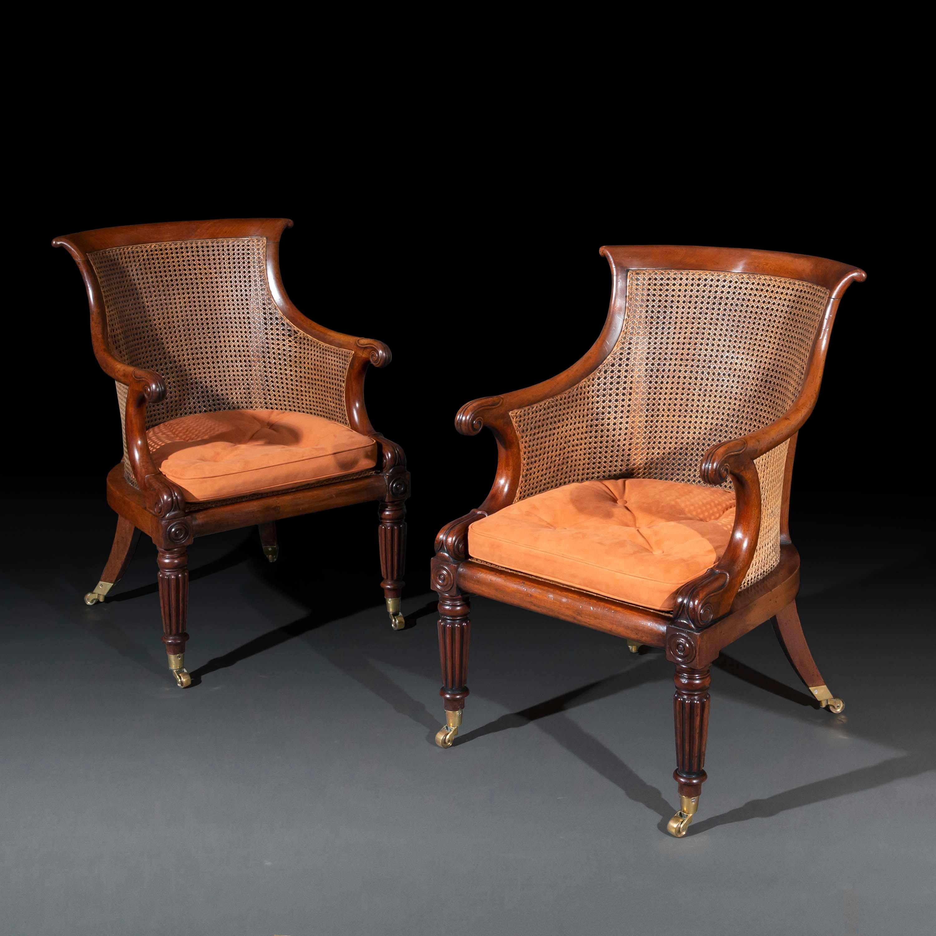 Hand-Carved Pair of Regency Bergère Armchairs in the manner of Gillows For Sale