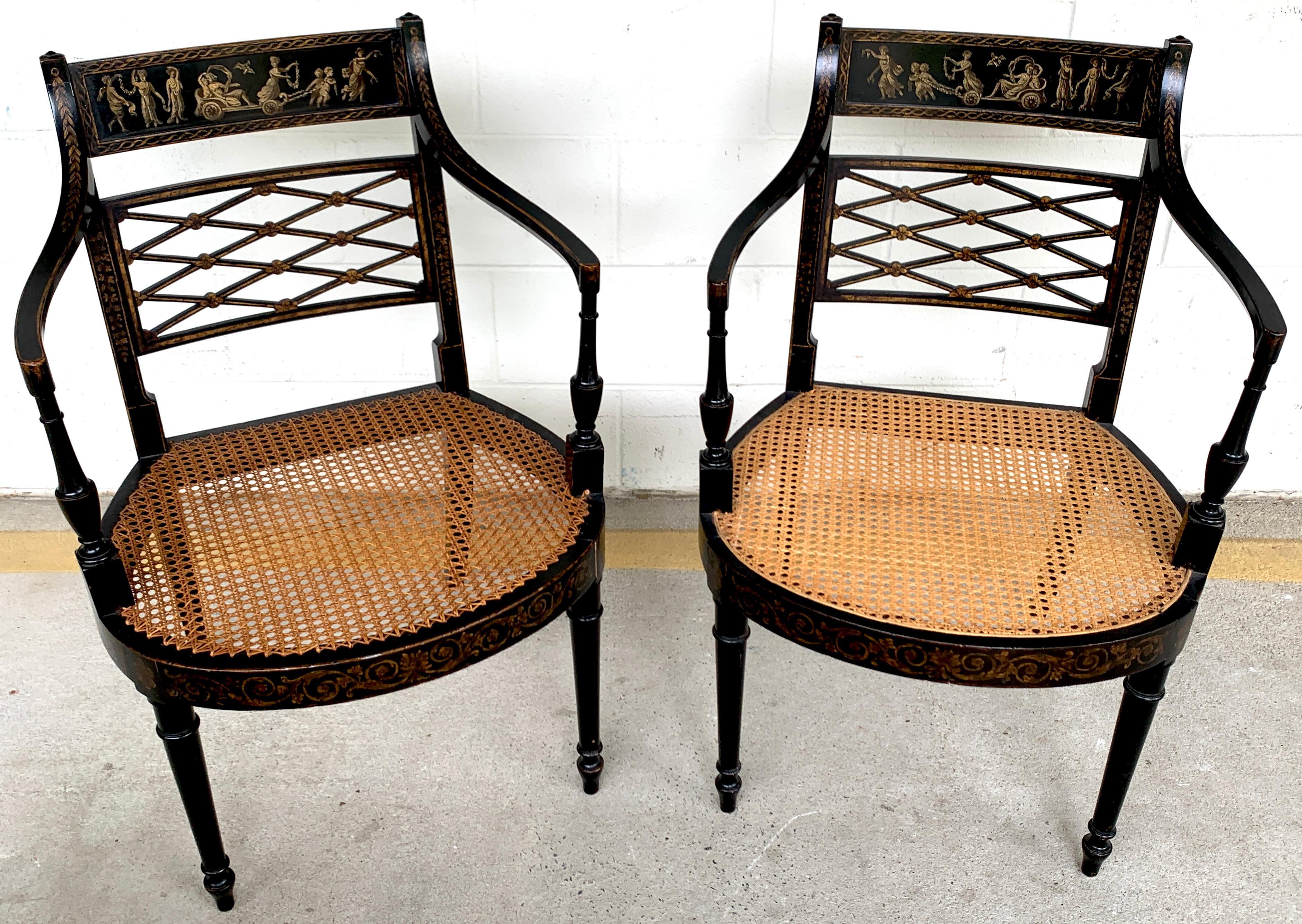 English Pair of Regency Black and Polychrome Cane Seat Armchairs