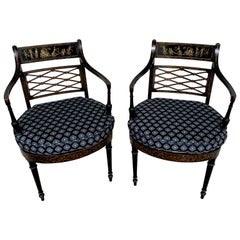 Pair of Regency Black and Polychrome Cane Seat Armchairs