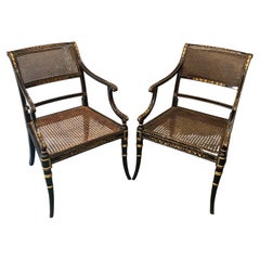 Pair of Regency black lacquer and gilt Armchairs