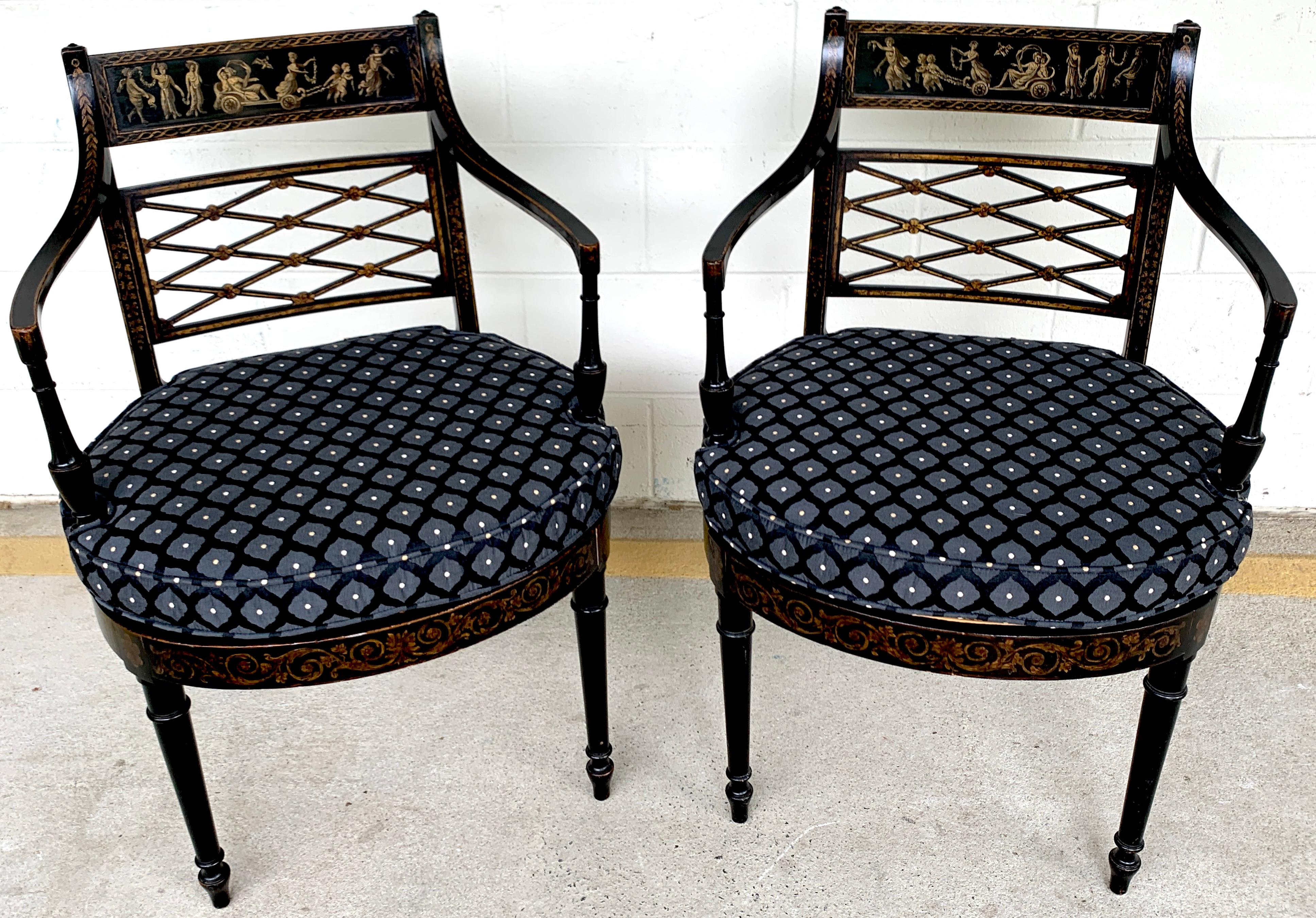 Pair of Regency black and polychrome cane seat armchairs, each one beautifully painted and gilt with classical scenes, cane seats, custom removable cushions
Seat height is 18.5