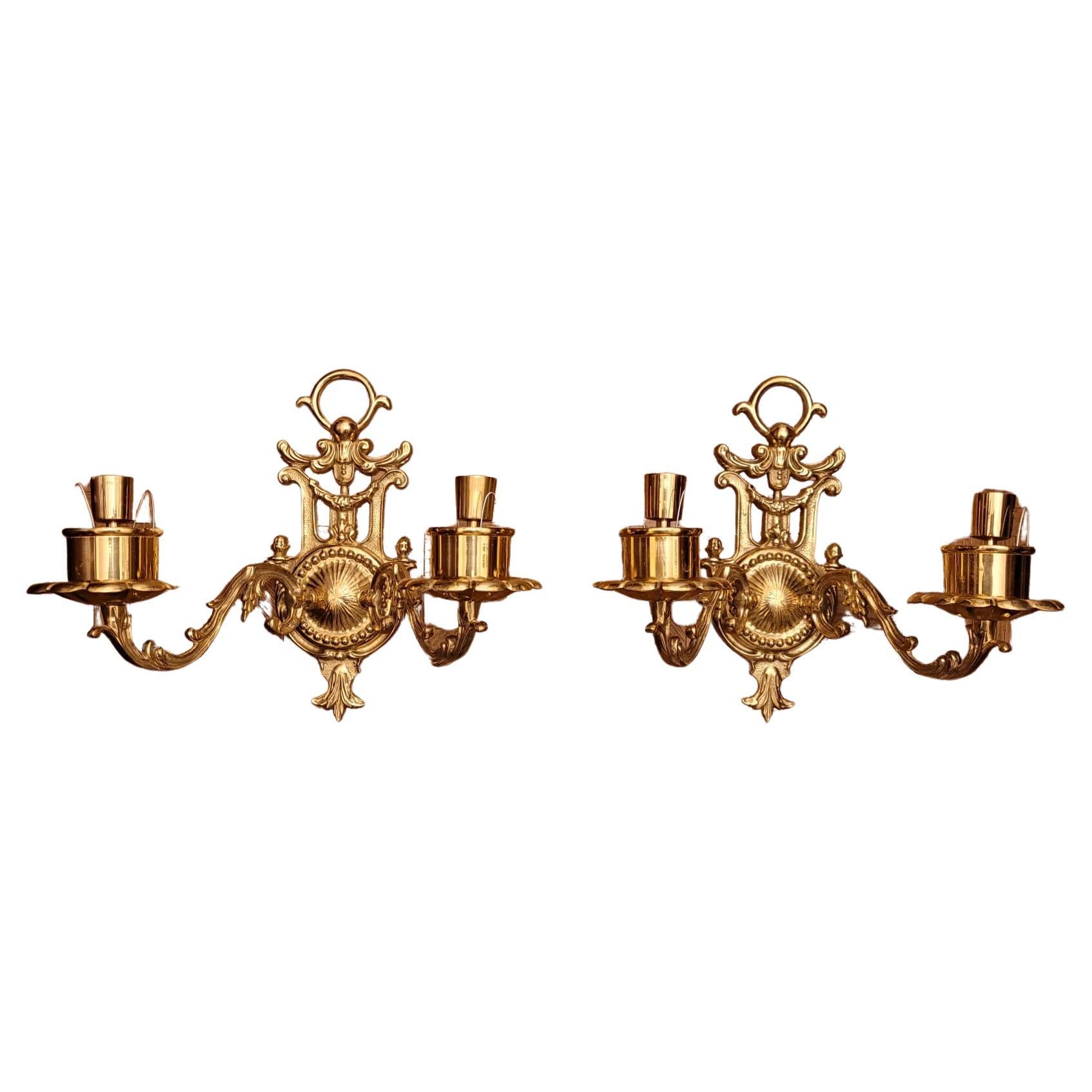 Pair of Regency Cast brass two-candle wall sconces in great condition.
Measures 12