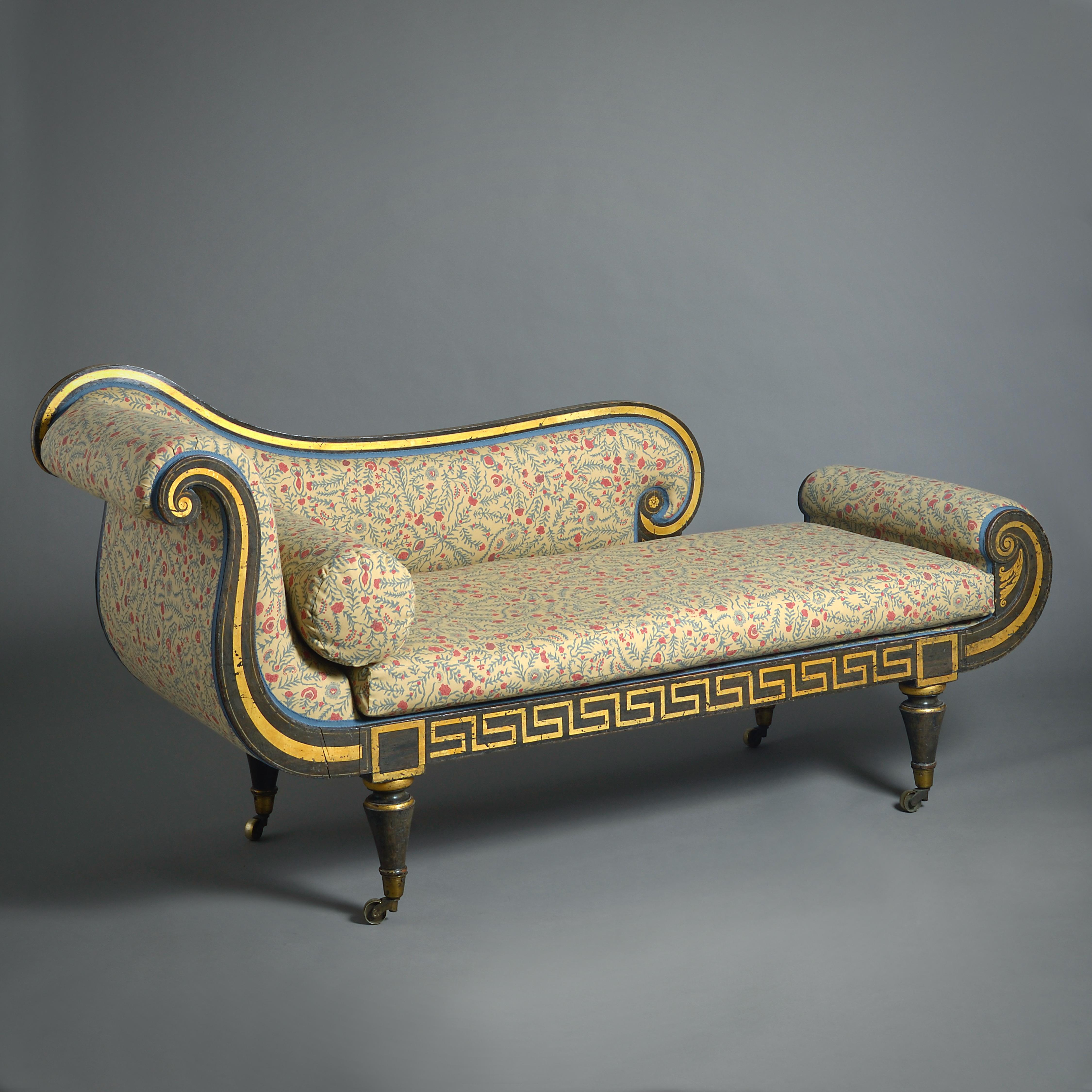 A FINE PAIR OF REGENCY GRAINED AND PARCEL-GILT CHAISE LONGUES, CIRCA 1815.

Retaining their original decoration.
