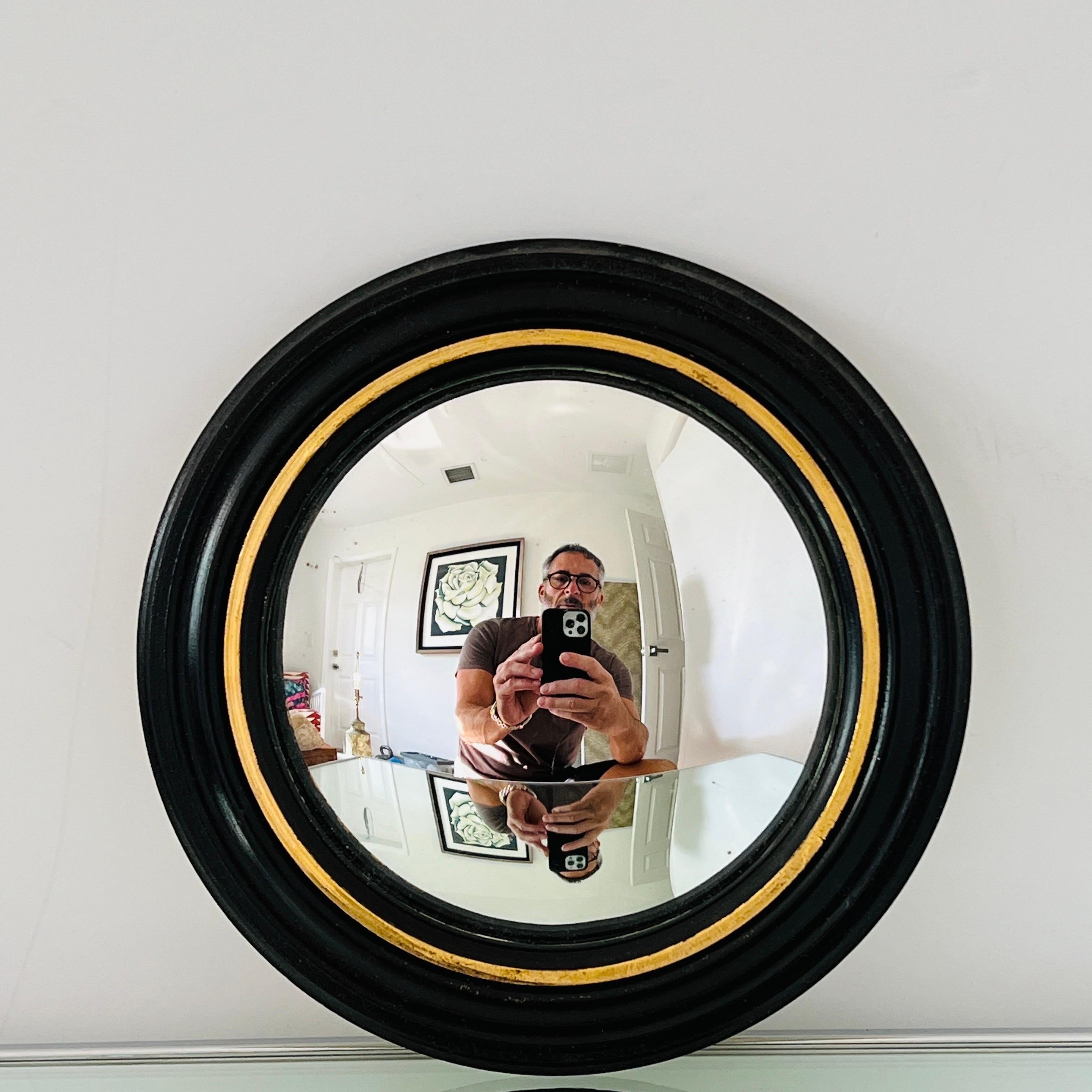 Hand-Carved Pair of Regency Convex Bullseye Mirrors in Black Plaster and Gold Leaf