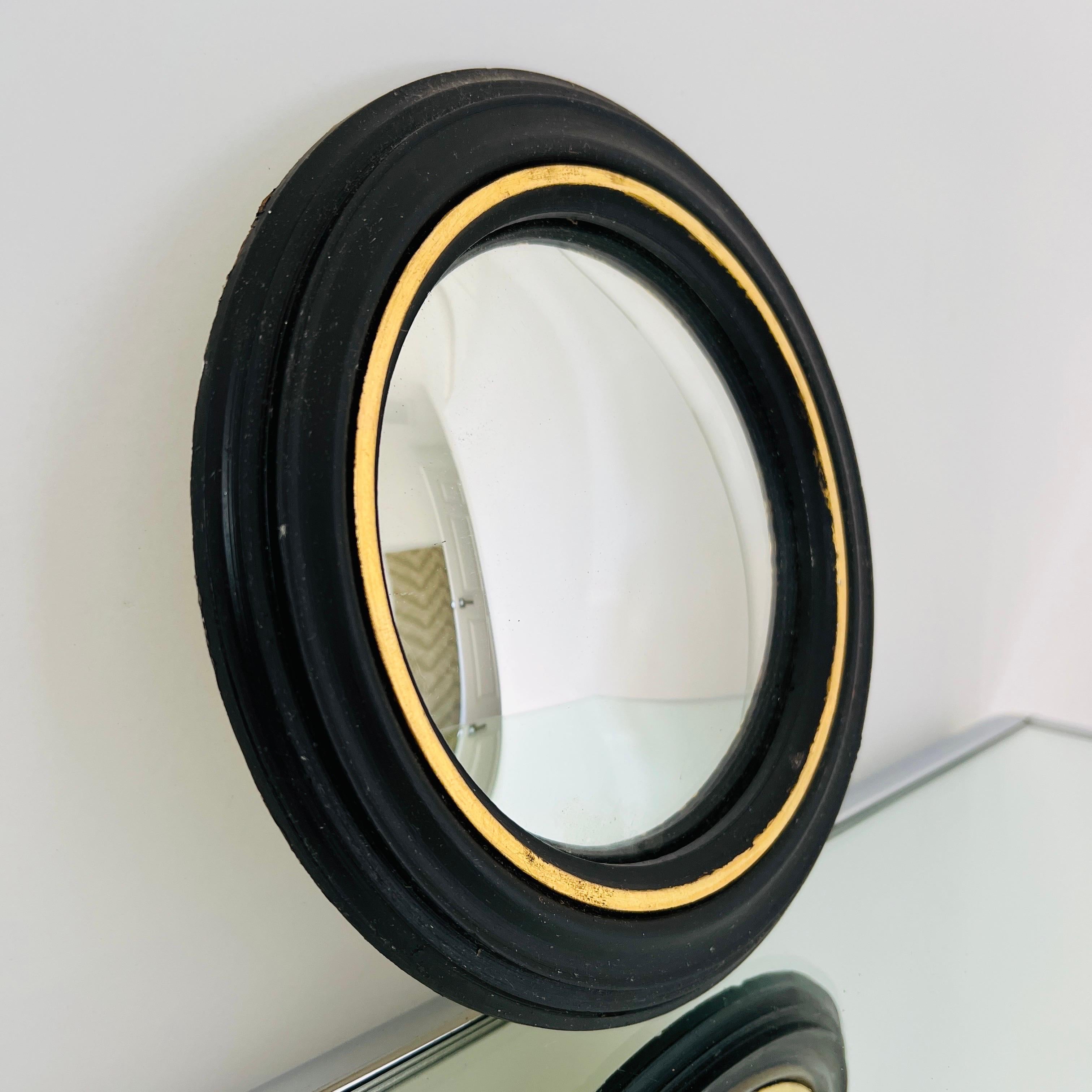 Pair of Regency Convex Bullseye Mirrors in Black Plaster and Gold Leaf In Good Condition In Fort Lauderdale, FL