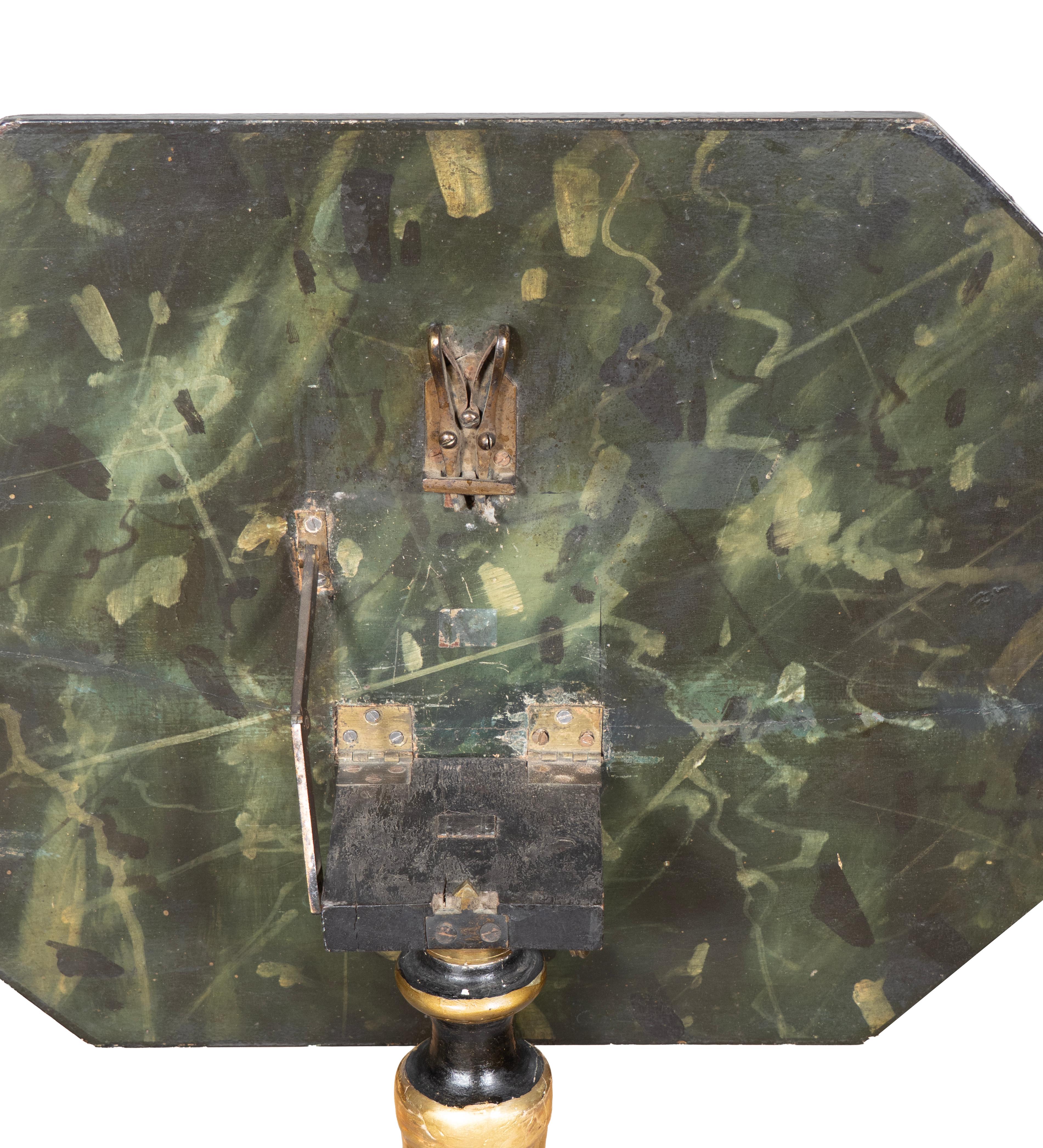 Bois doré Paire de chandeliers de style Régence en bois doré et ébonisé