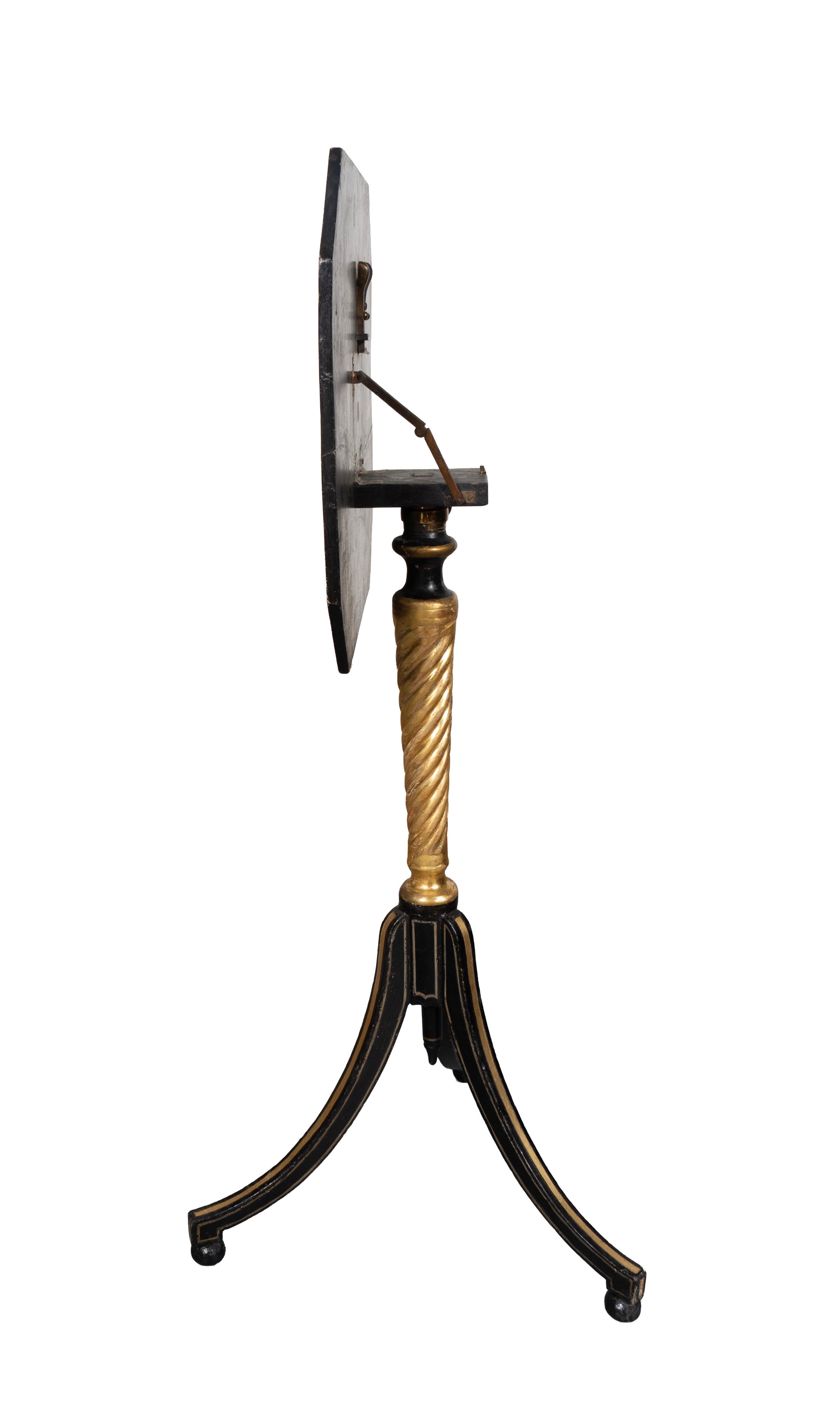 Paire de chandeliers de style Régence en bois doré et ébonisé 1