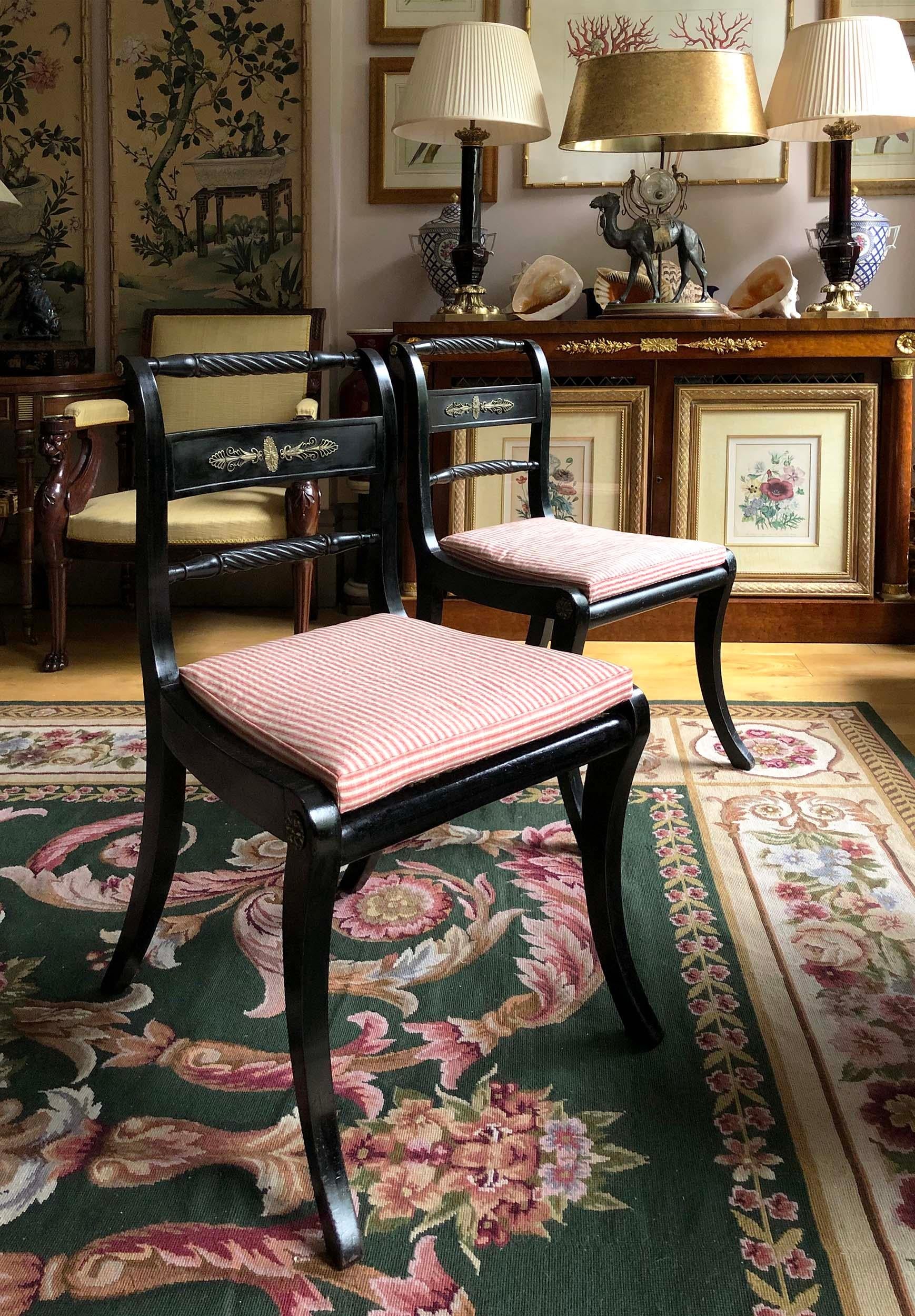 English Pair of Regency Ebonized Klismos Chairs