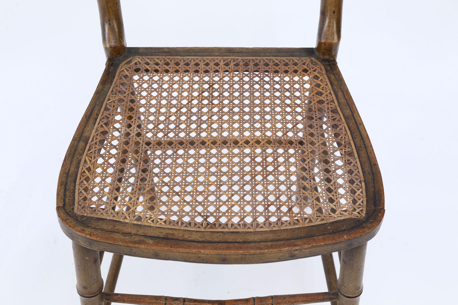 Cane Pair of Regency Faux Bamboo Painted Chairs