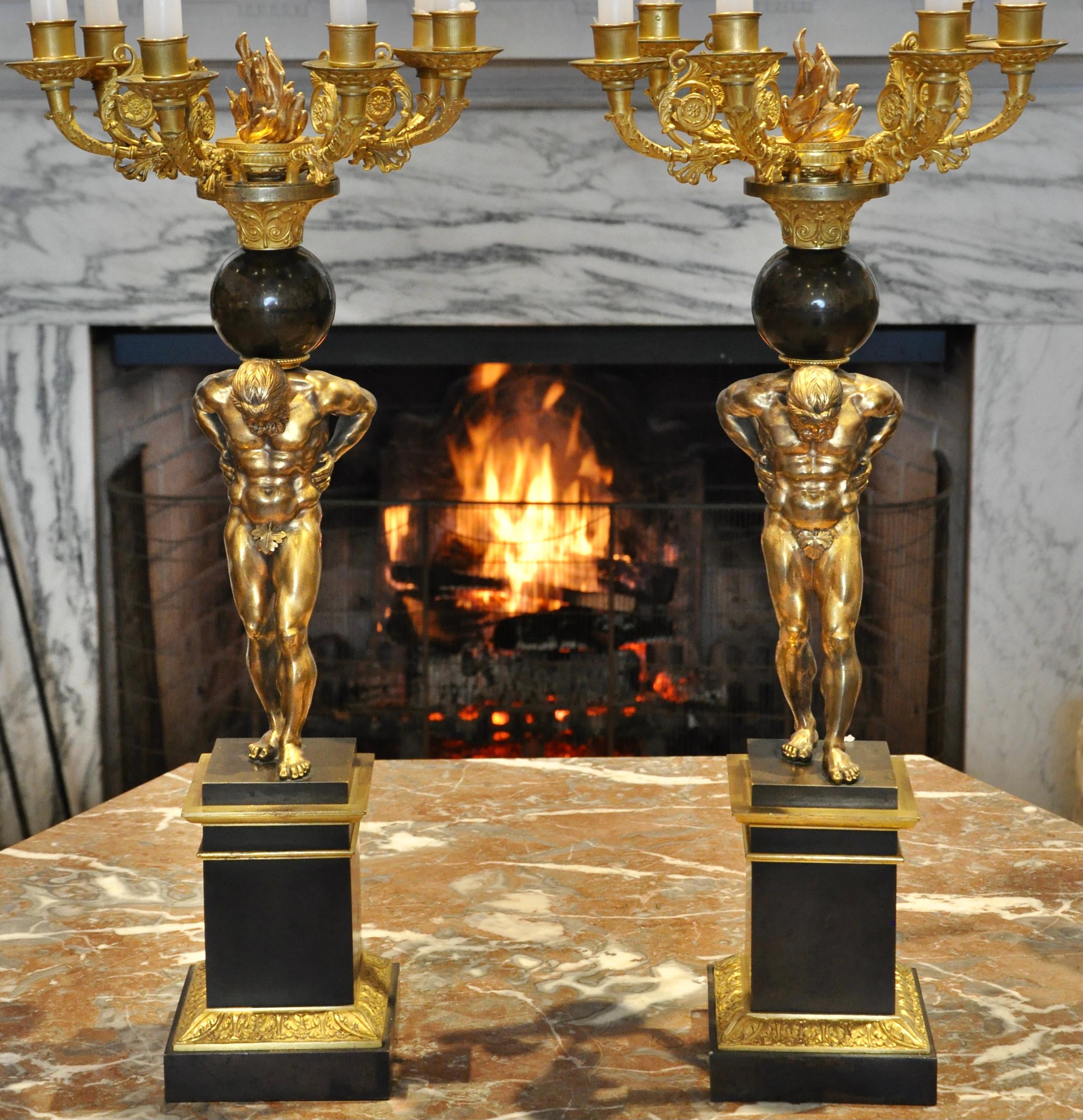 Pair of Regency or William IV figural candelabra in form of Atlas and a globe. Six arms issuing from top. Patinated bronze, gilded bronze and bronze. A truly rare from. Attributed to messenger. Neoclassical.
