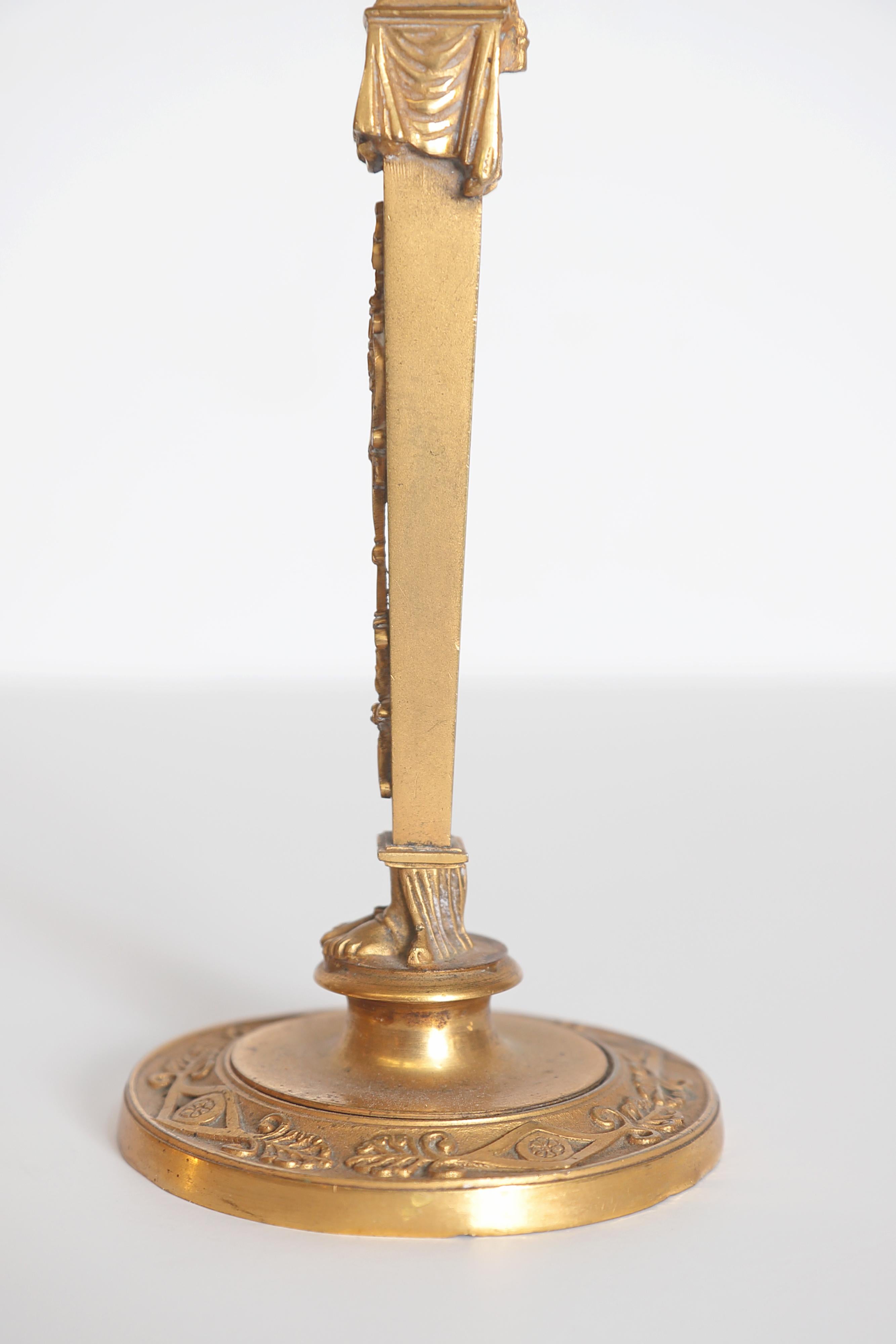 19th Century Pair of Regency Gilt Bronze Candlesticks in the Egyptian Taste For Sale