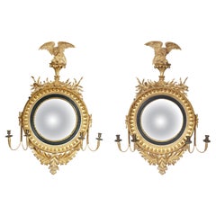 Antique Pair Of Regency Giltwood And Ebonized Convex Girandole Mirrors