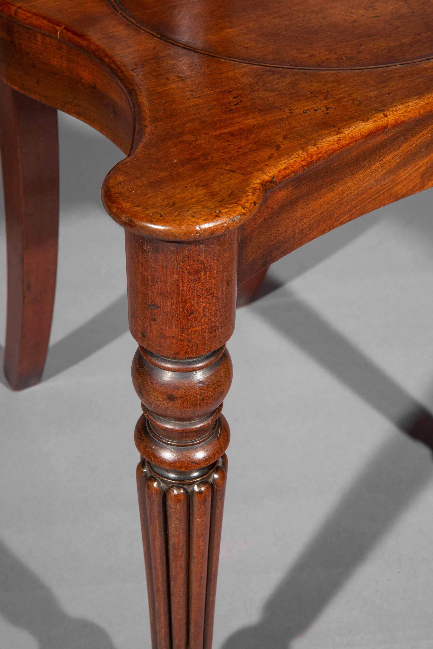 Walnut Pair of Regency Hall Chairs in the manner of Gillows