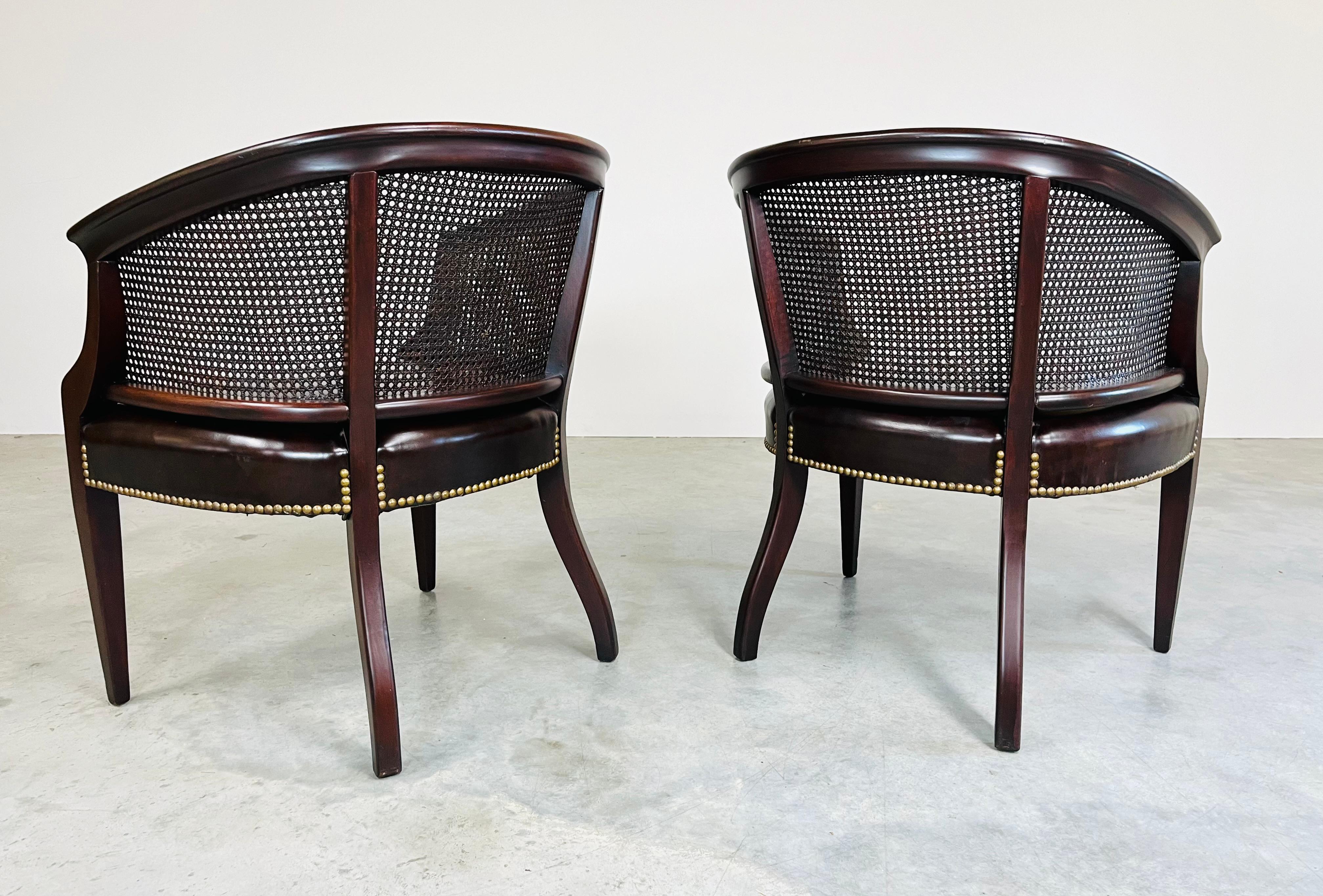 Mid-20th Century Pair of Regency Hickory Chair Co. Cane Barrel Back Club Chairs Having Lithe Legs For Sale