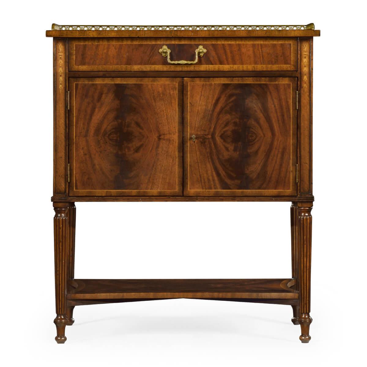A pair of English Regency style mahogany side table or bedside table with mahogany crotch veneer, oak secondary wood, finely pierced patinated brass gallery, crossbanding and bellflower inlays, a long single drawer above a two-door cupboard with an
