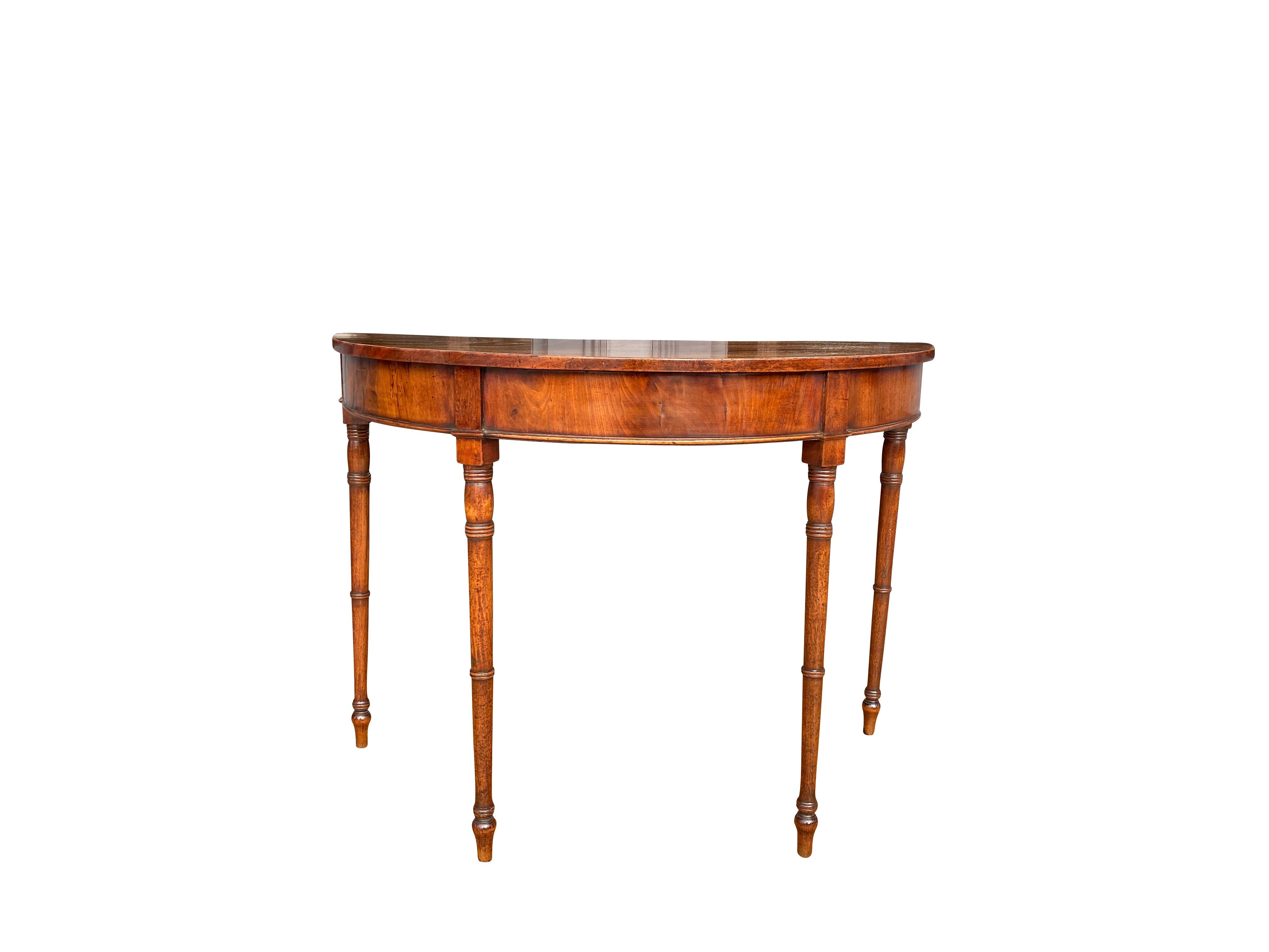 Each demilune shape with conforming frieze raised on circular tapered bamboo turned legs. Ex ; Sothebys NY sale.