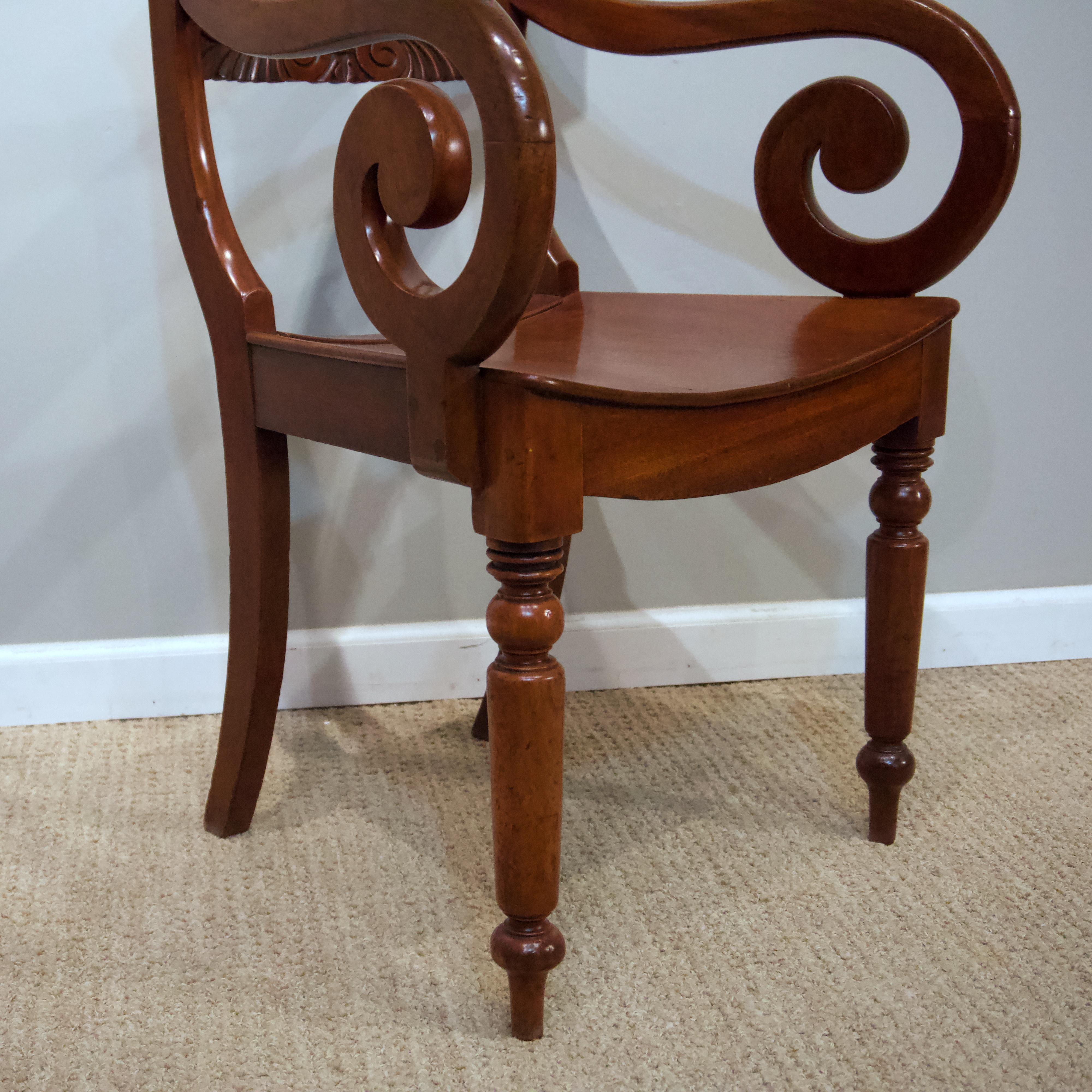 Polished Pair of Regency Mahogany Saddle Seat Armchairs For Sale