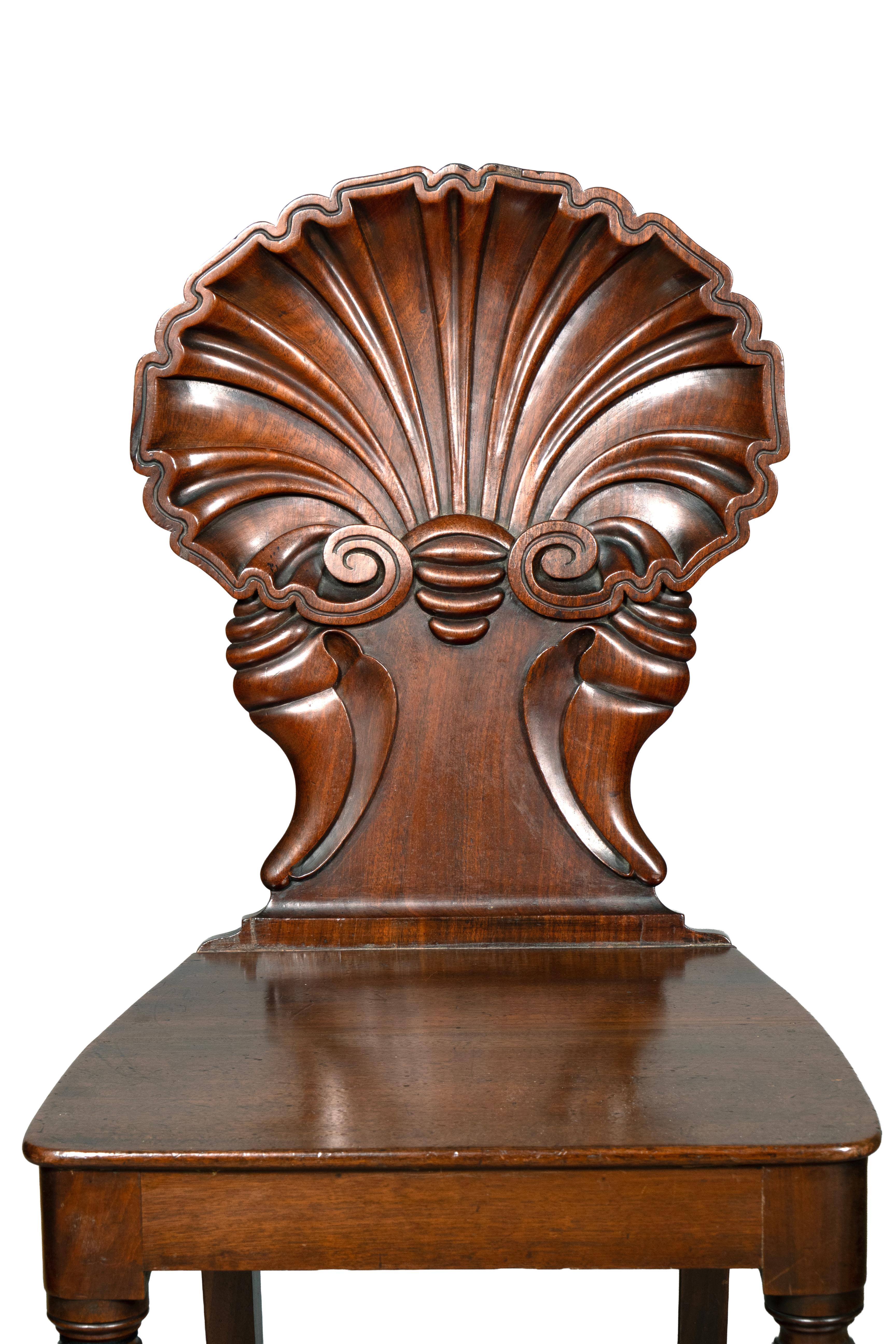 English Pair Of Regency Mahogany Shell Back Hall Chairs For Sale