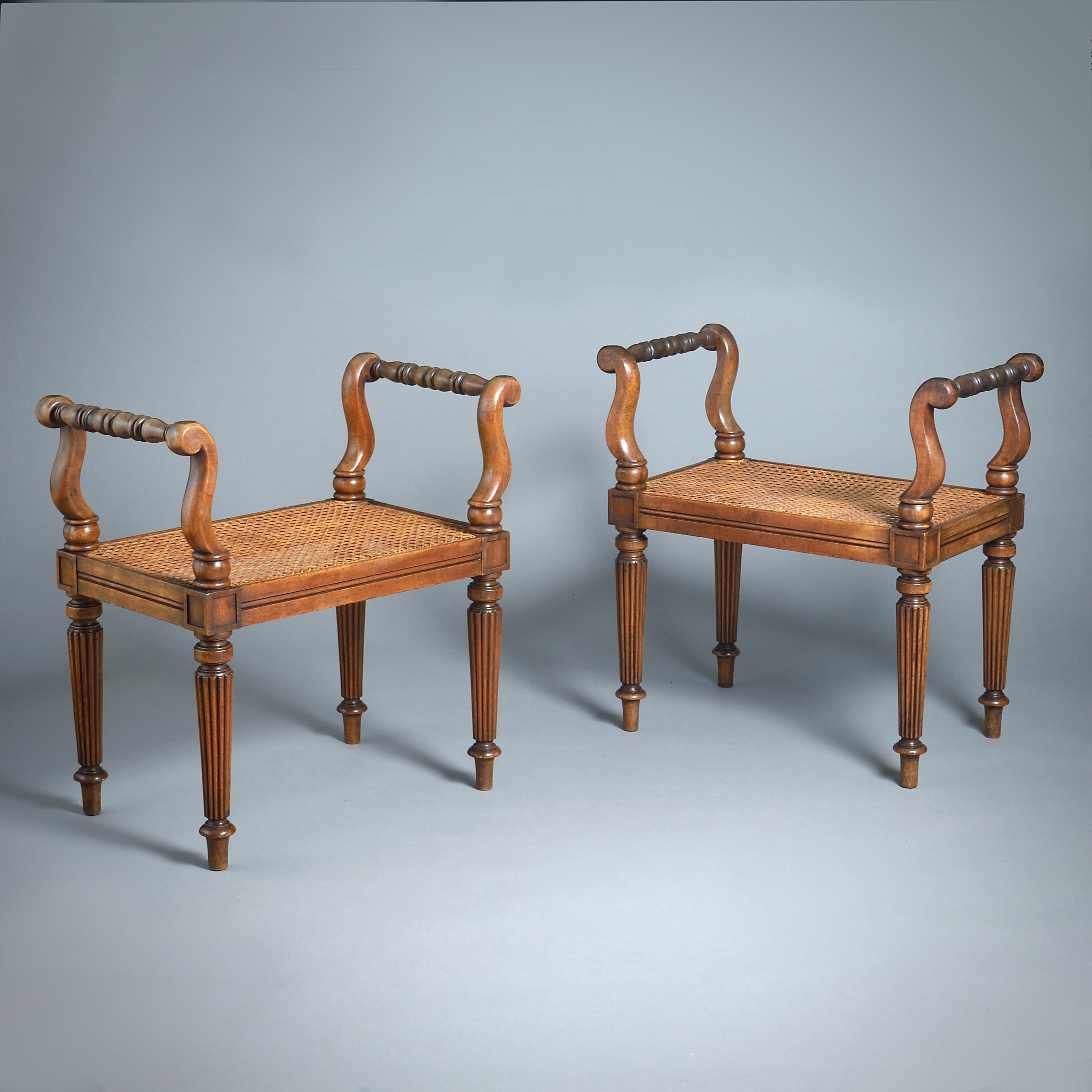 UNE BELLE PAIRE DE TABOURETS EN ACAJOU DE STYLE RÉGENCE, VERS 1815.

Chacun d'entre eux est équipé d'un coussin d'assise ajusté (non illustré).