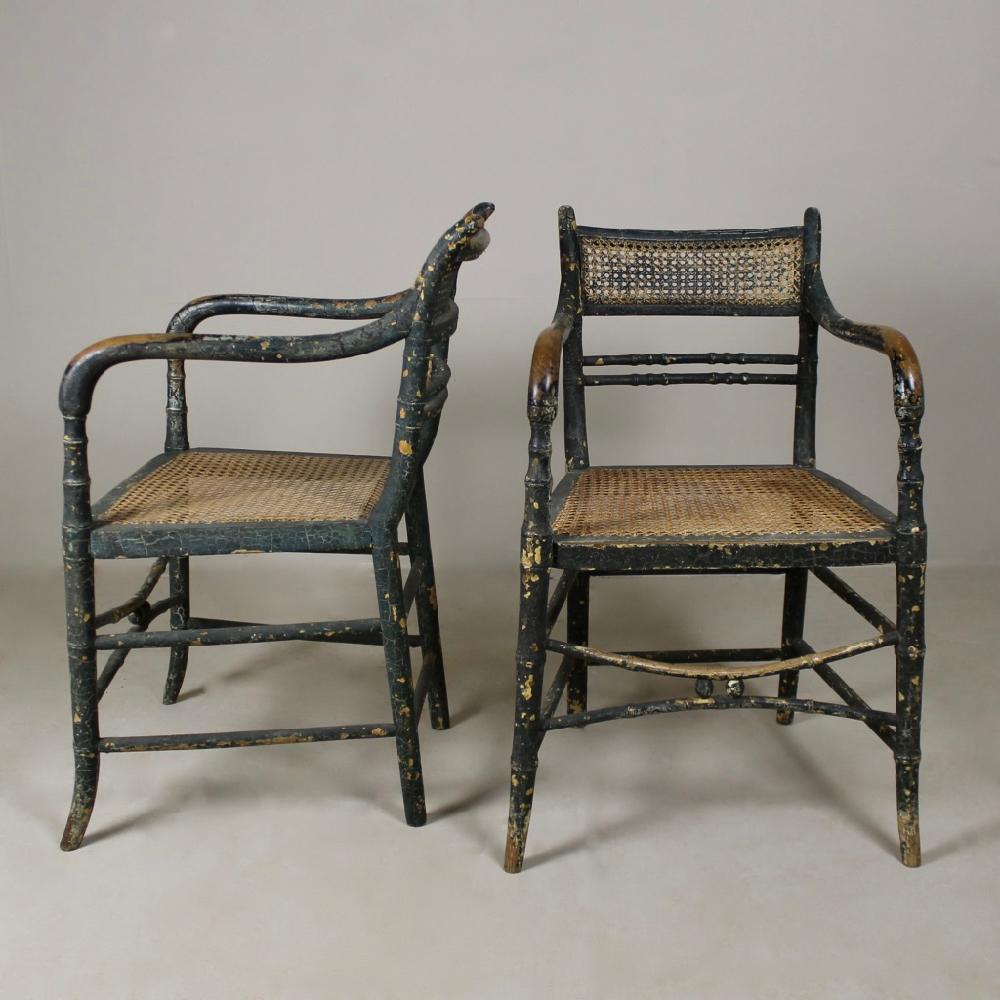 A great pair, of Regency period, faux bamboo armchairs. Retaining many layers of ancient paint, all time worn and crazed to the most wonderful patination.

English, circa 1820.