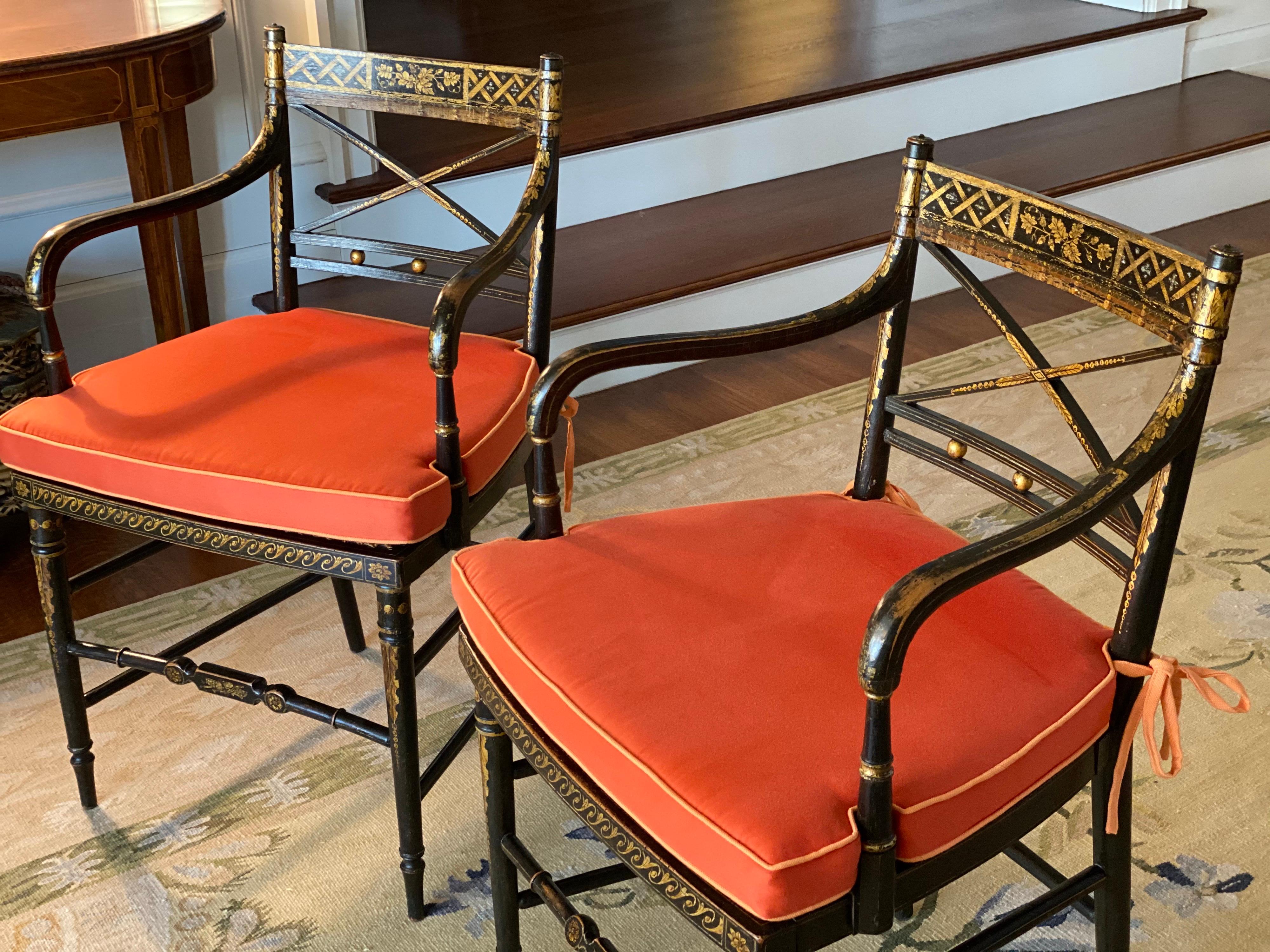 Fine pair of Regency parcel-gilt rosewood-grained caned armchairs, circa 1810
Original paint and gilt decoration. Hand caning in good condition. Custom cushions in orange fabric in very good condition.
England, circa 1810
Frame dimensions: 20.25