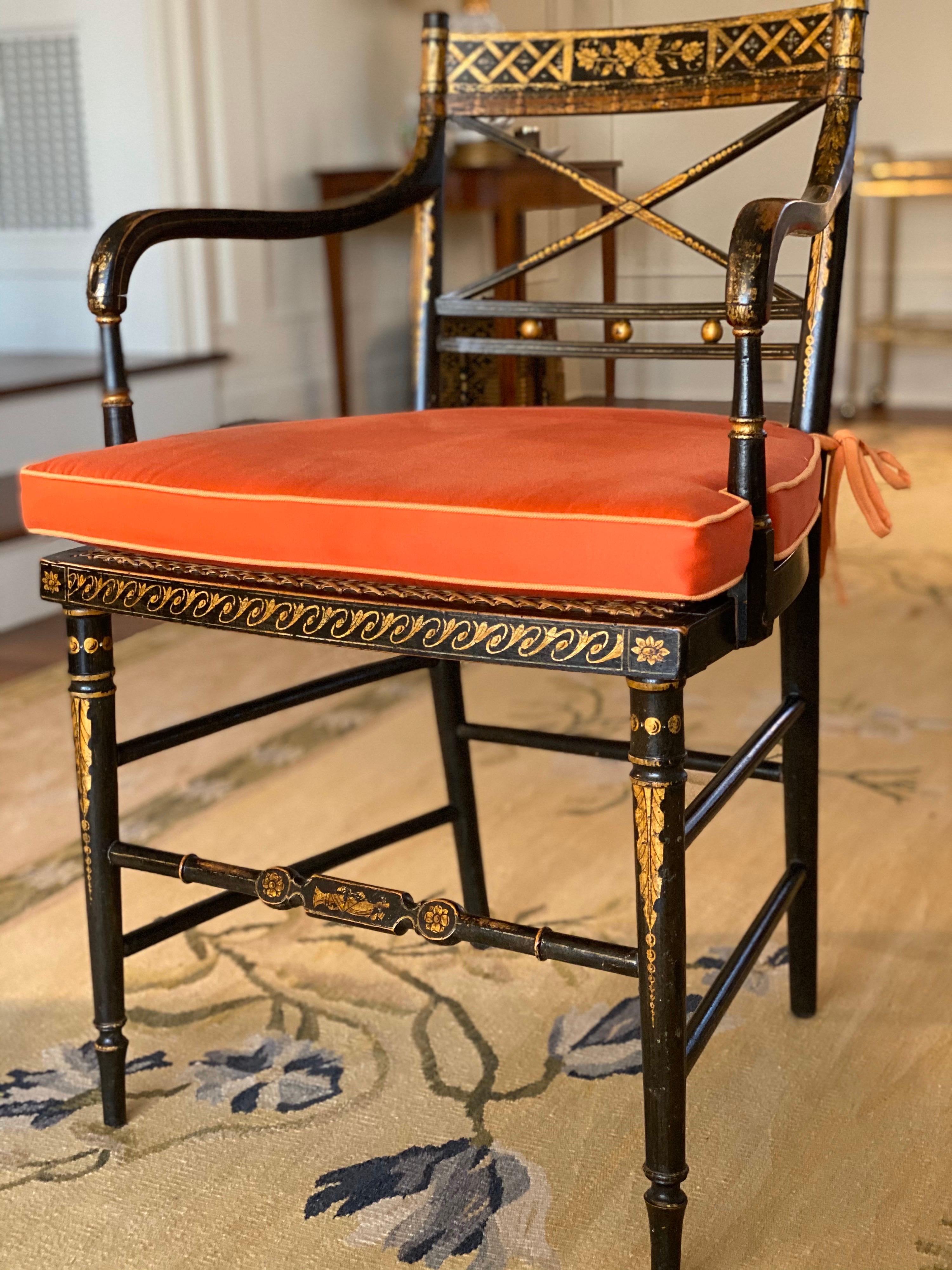 English Pair of Regency Parcel-Gilt Rosewood-Grained Caned Armchairs, circa 1810