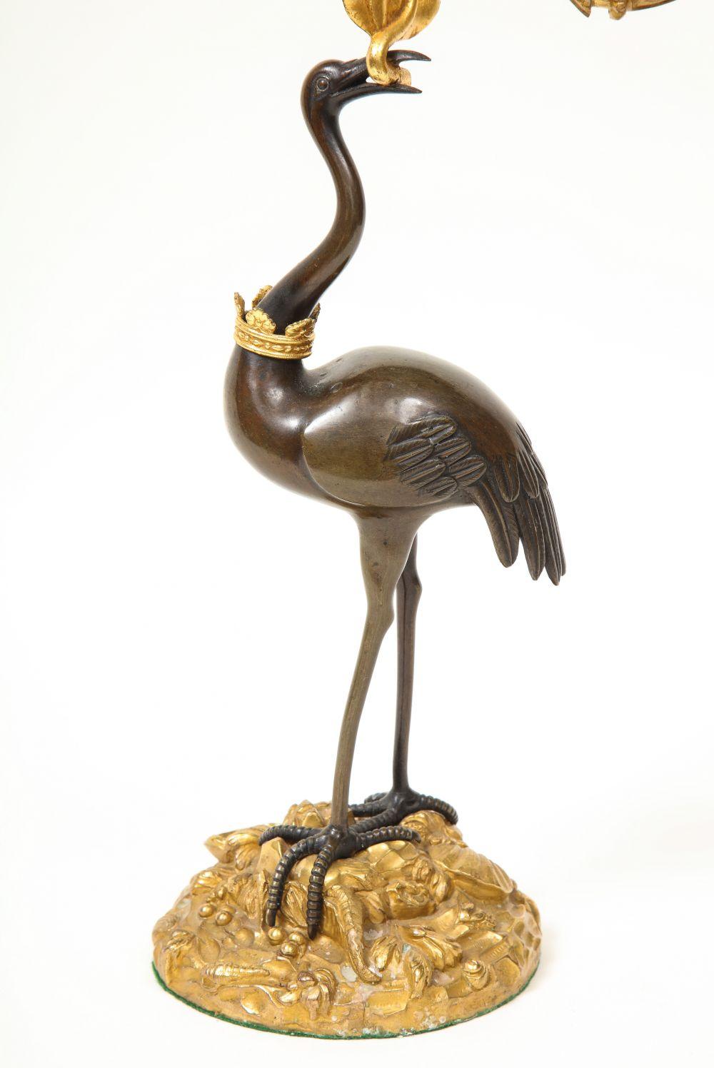 Pair of Regency Patinated and Gilt Bronze Ostrich-Form Two Light Candelabra In Good Condition In New York, NY