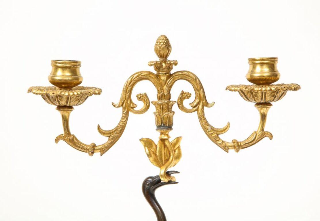 19th Century Pair of Regency Patinated and Gilt Bronze Ostrich-Form Two Light Candelabra