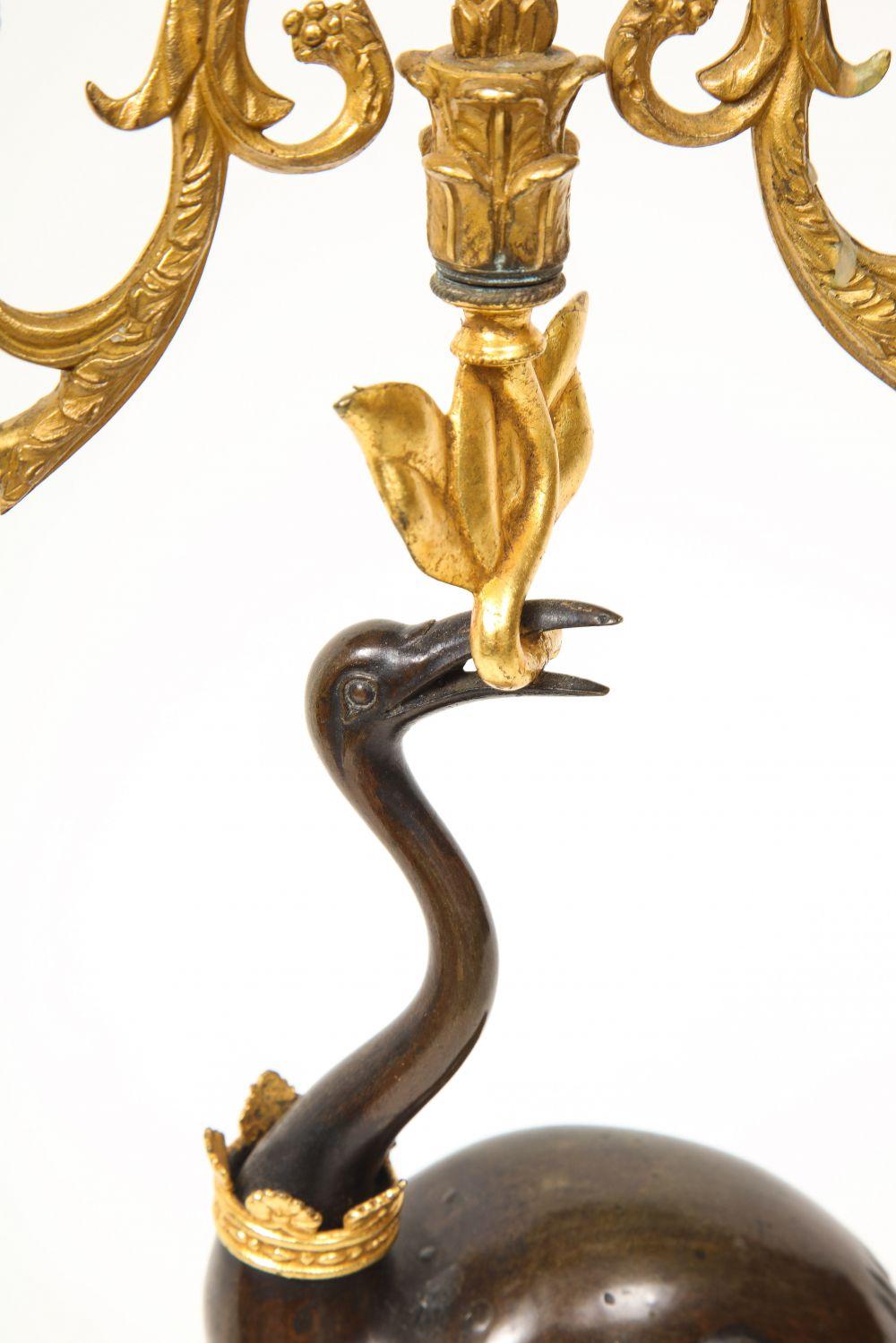 Pair of Regency Patinated and Gilt Bronze Ostrich-Form Two Light Candelabra 2
