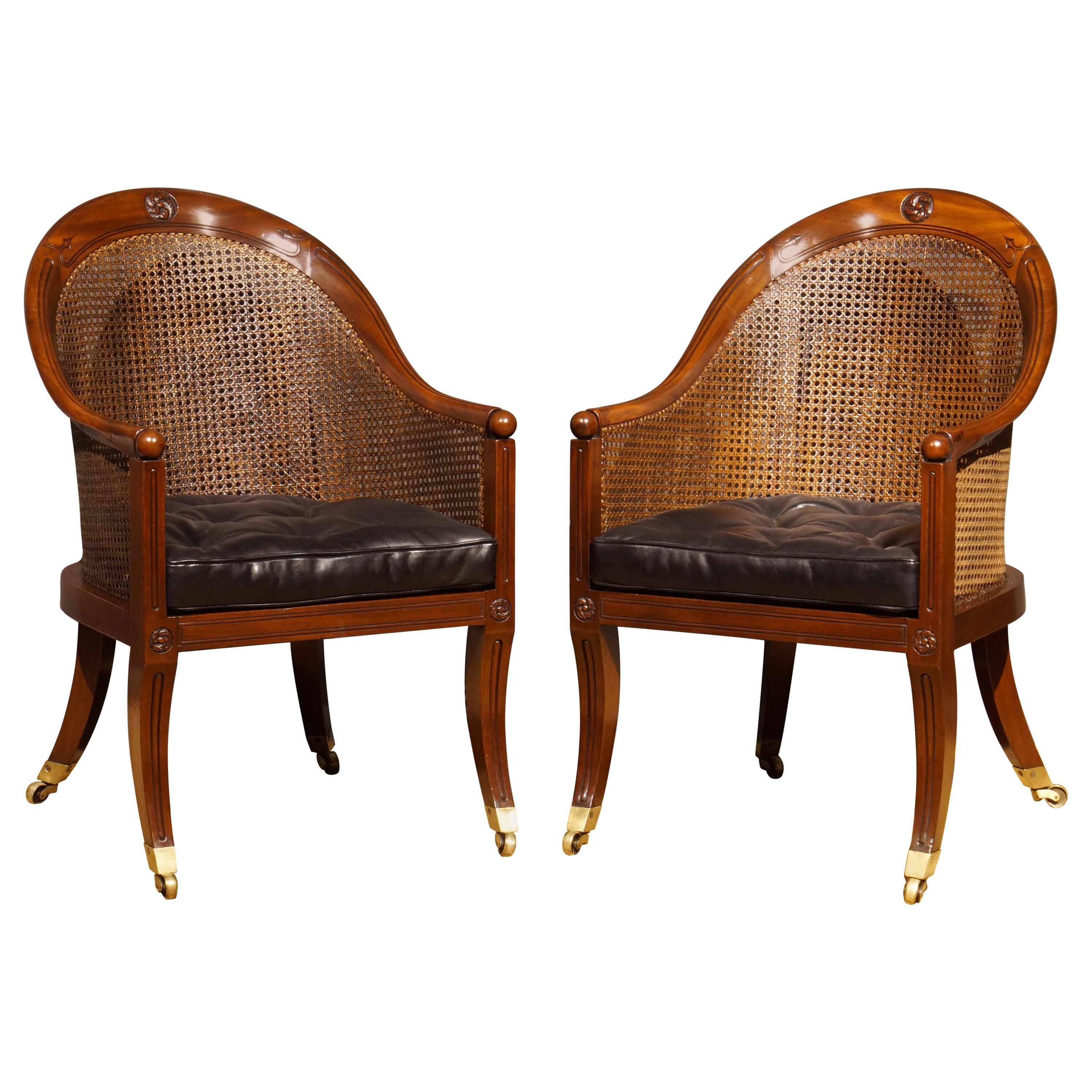 Pair of Regency Period Mahogany and Caned Library Bergeres For Sale