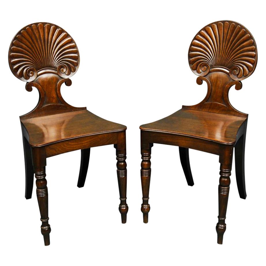 Pair of Regency Period Mahogany Shell Back Hall Chairs