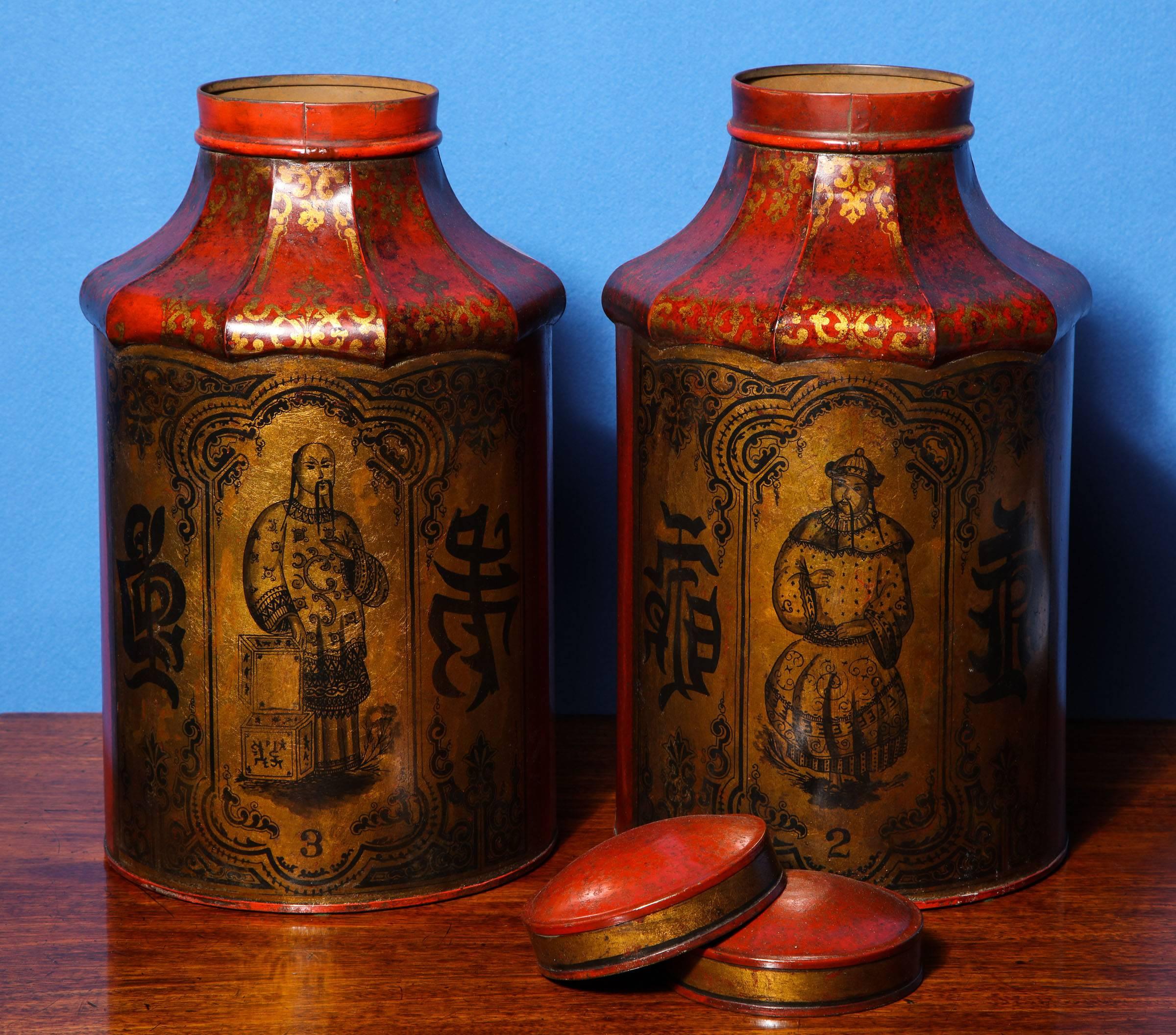 Fine Pair of English Regency Chinoiserie Tea Cannisters, each of cylindrical form with a black and gilt 