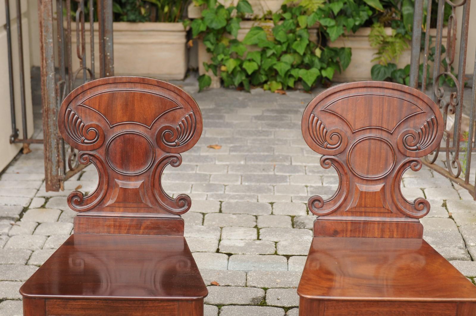 Pair of Regency Style 1870s Carved Mahogany Hall Chairs with C-Scroll Backs 5
