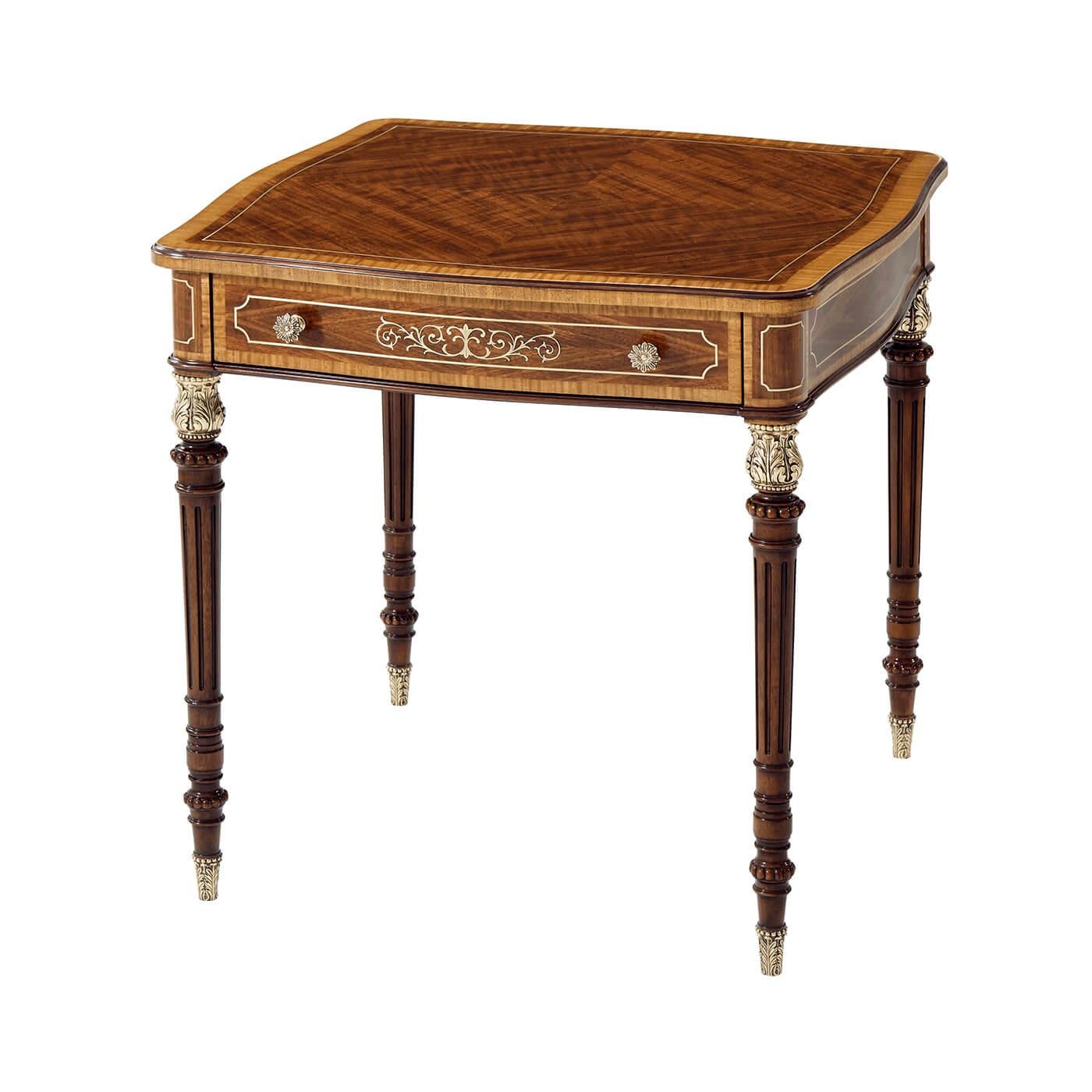 English Regency style mahogany and exotic wood veneer side table with floral and brass line inlaid details on turned gilded acanthus capital supports with fluting.

Dimensions: 26