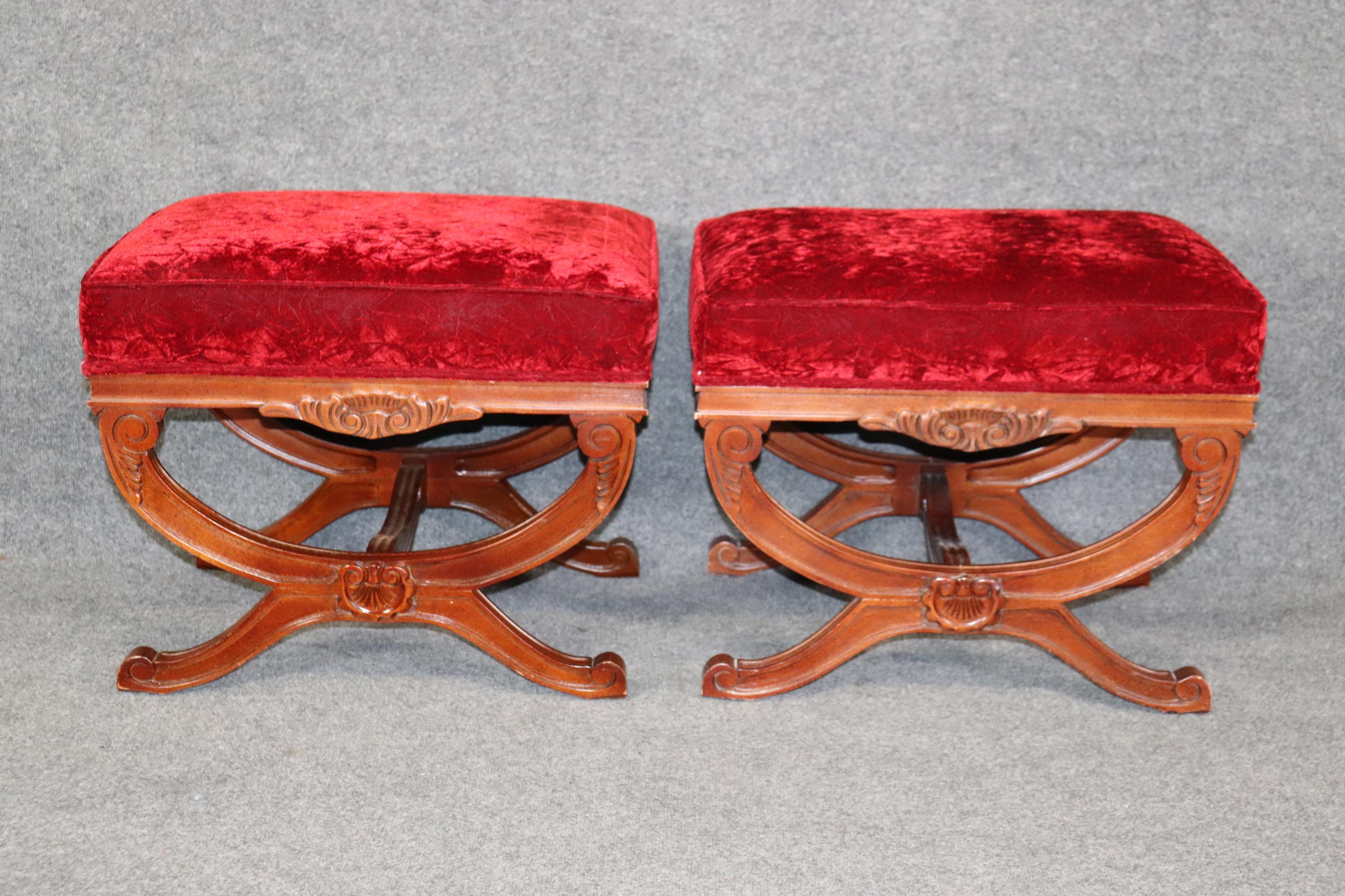 Dimensions- H: 19in W: 23 1//2in D: 17 1/4in 
This Pair of Regency Style Carved Upholstered Benches are made of the highest quality and are perfect if you want to bring a classy look into your home! This pair is equipped with red velvet style