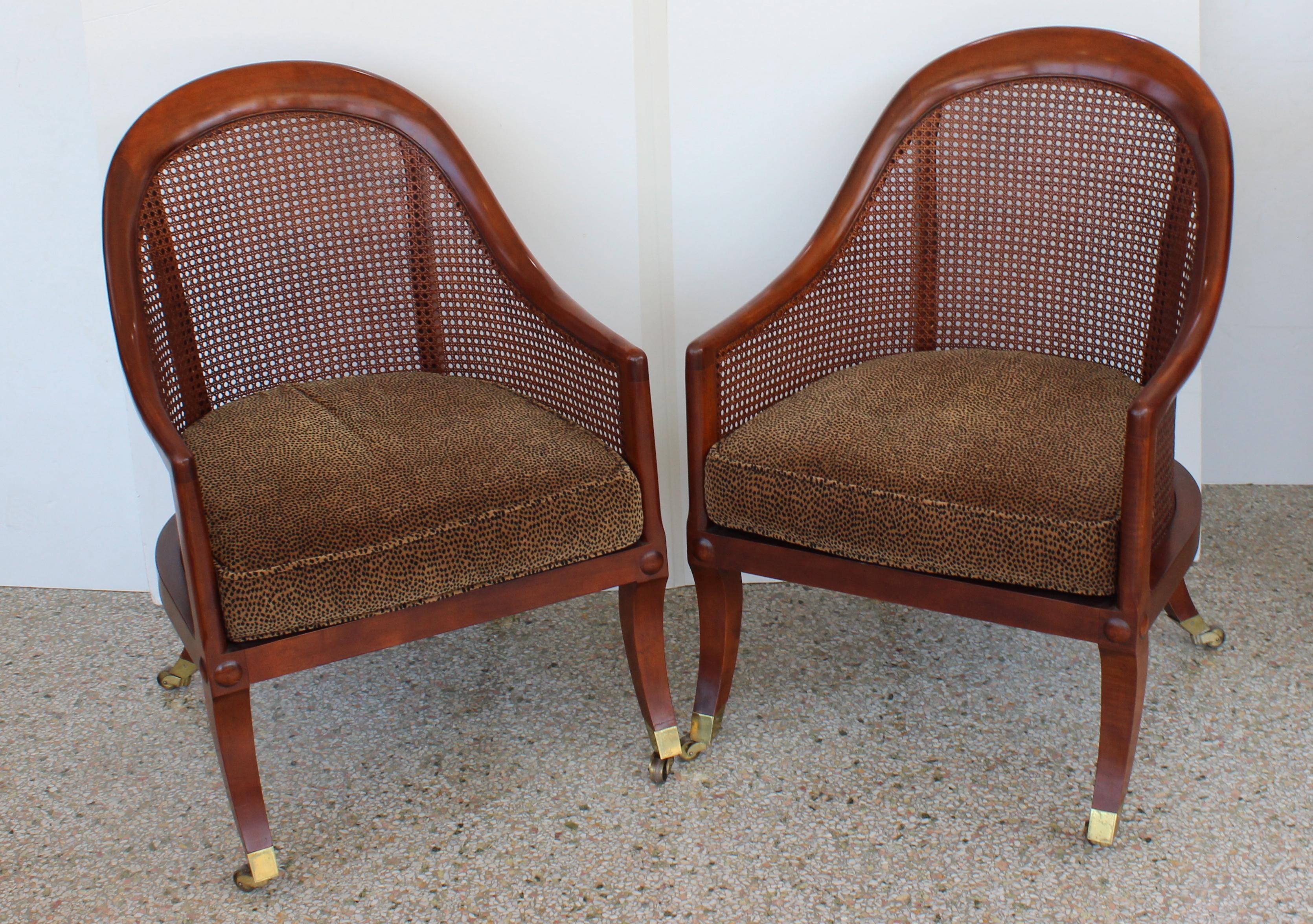 This stylish pair of English Regency style chairs date to the 1980s and were sold by Baker Furniture.

Note: The seat cushion has a hidden zippper. 

Note: There are another pair of identical chairs from our gallery also listed on the Dibs