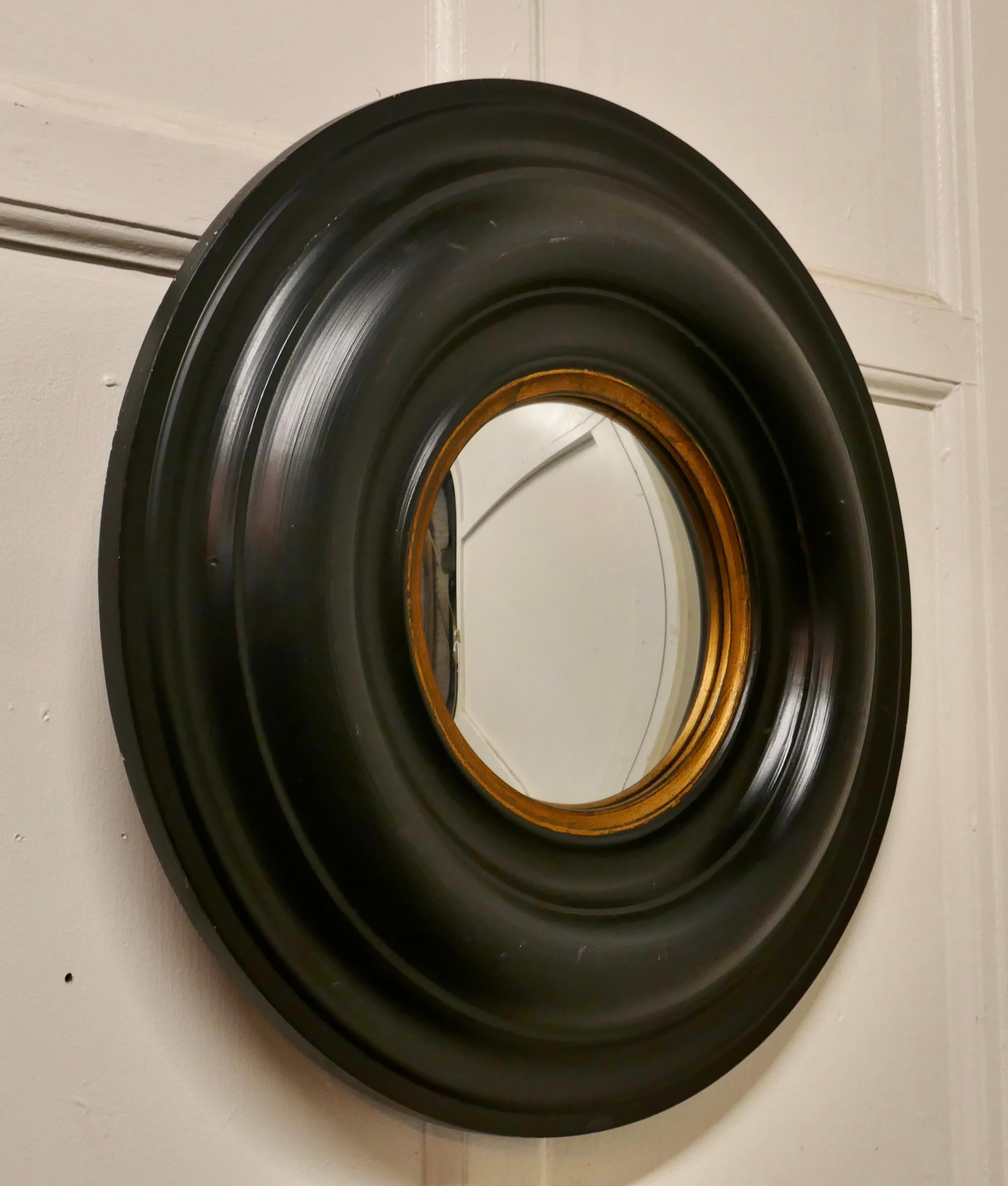 20th Century Pair of Regency Style Ebonised Round Convex Mirrors 