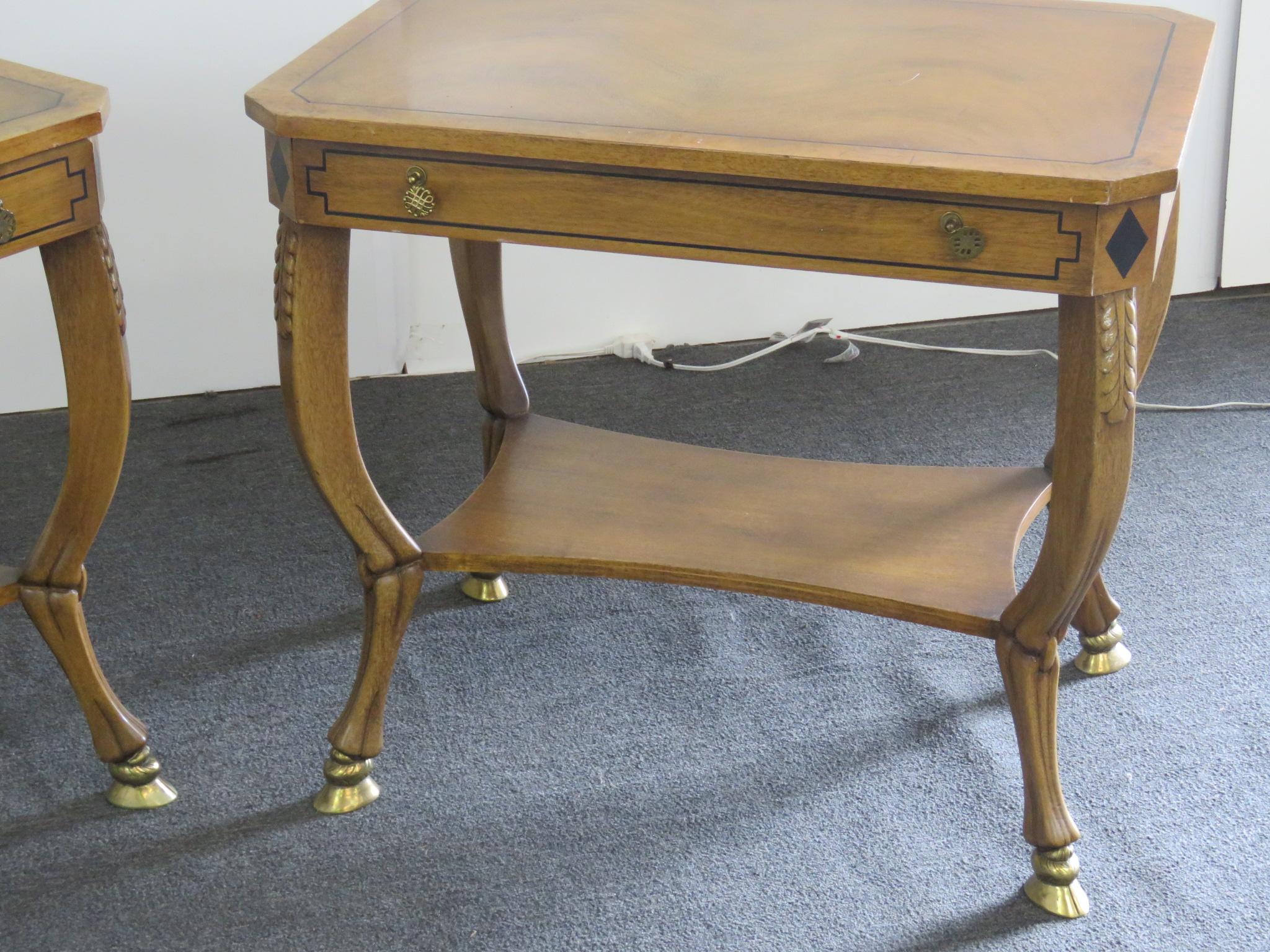 Pair of Regency style paint decorated end tables with 1 drawer and brass feet.