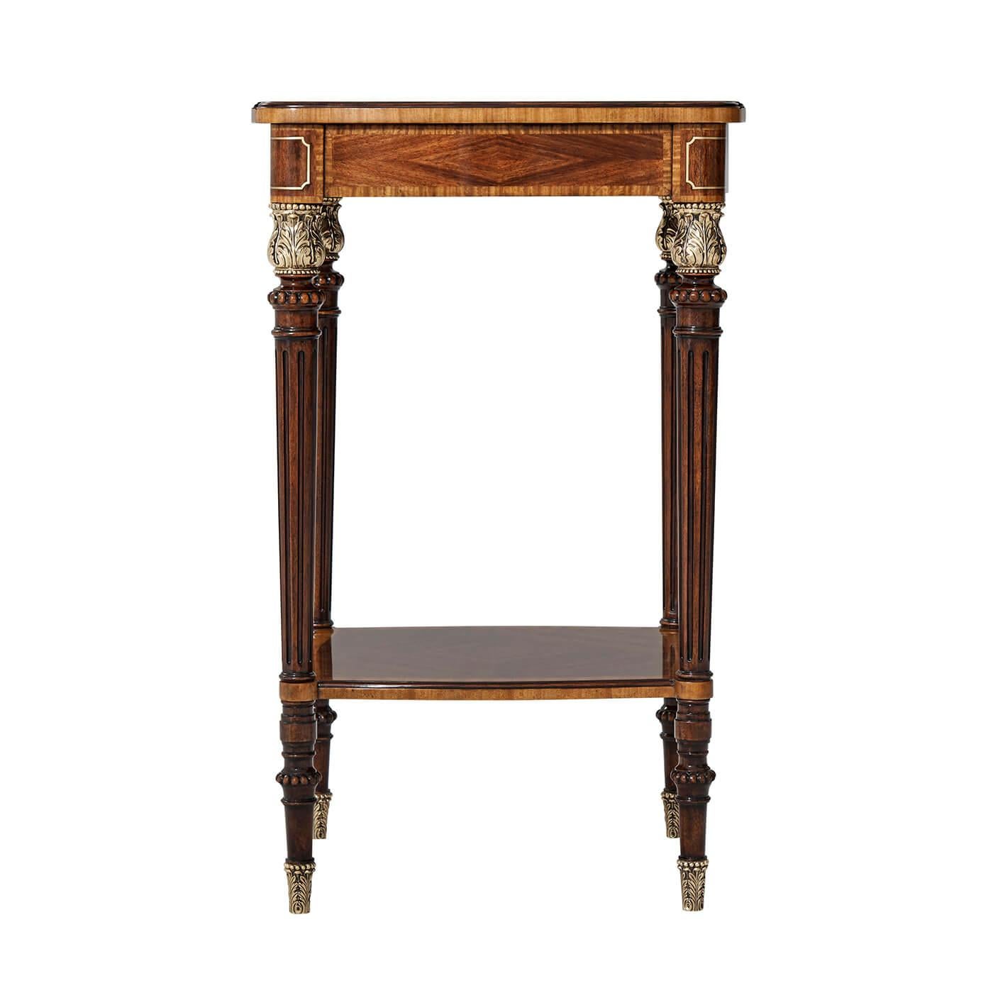 English Regency style mahogany and exotic wood veneer end table with brass line inlaid details on turned gilded acanthus capital supports with fluting and a shelf stretcher base.

Dimensions: 18