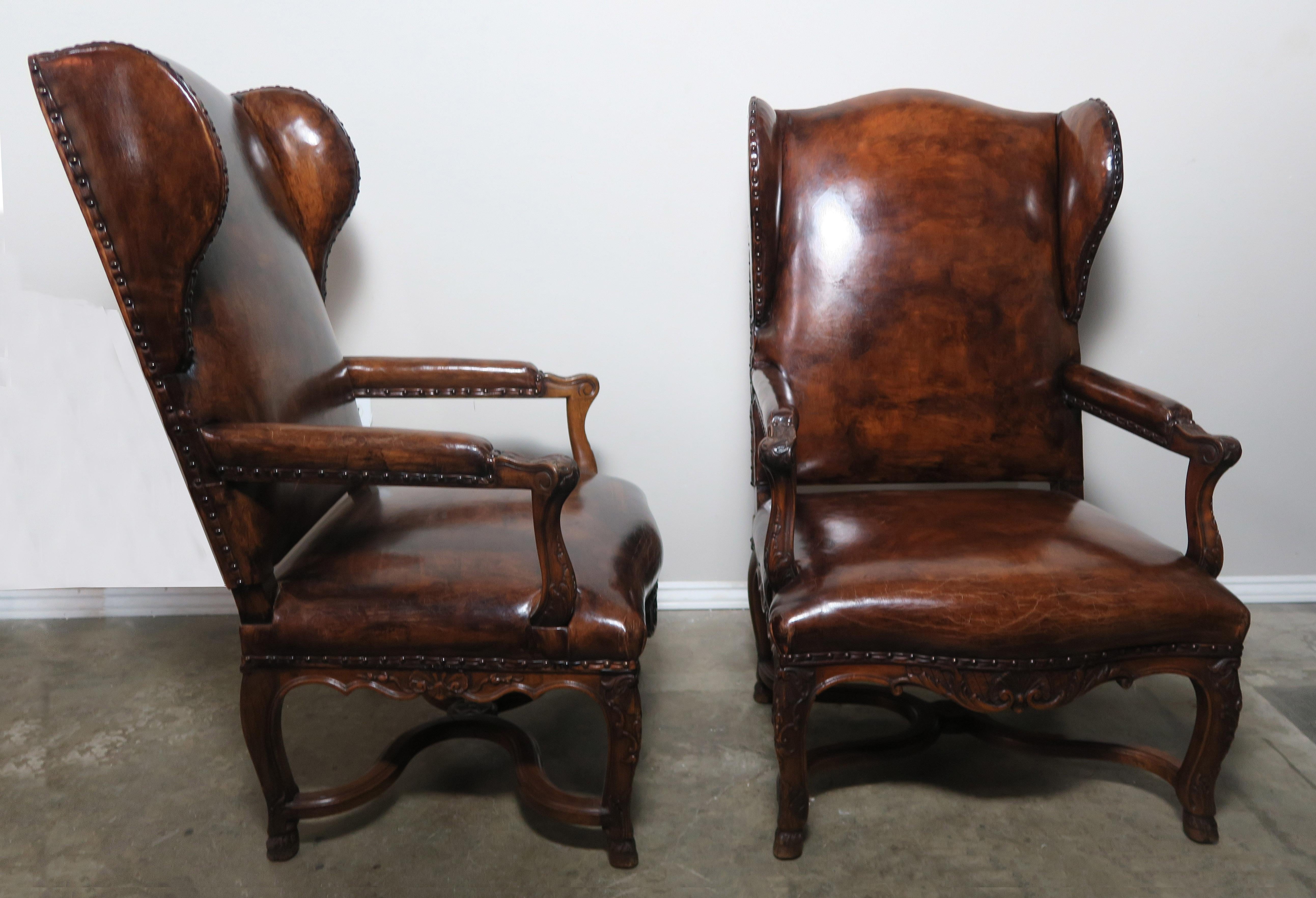 Pair of Regency Style French Leather Wing-Back Armchairs In Distressed Condition In Los Angeles, CA