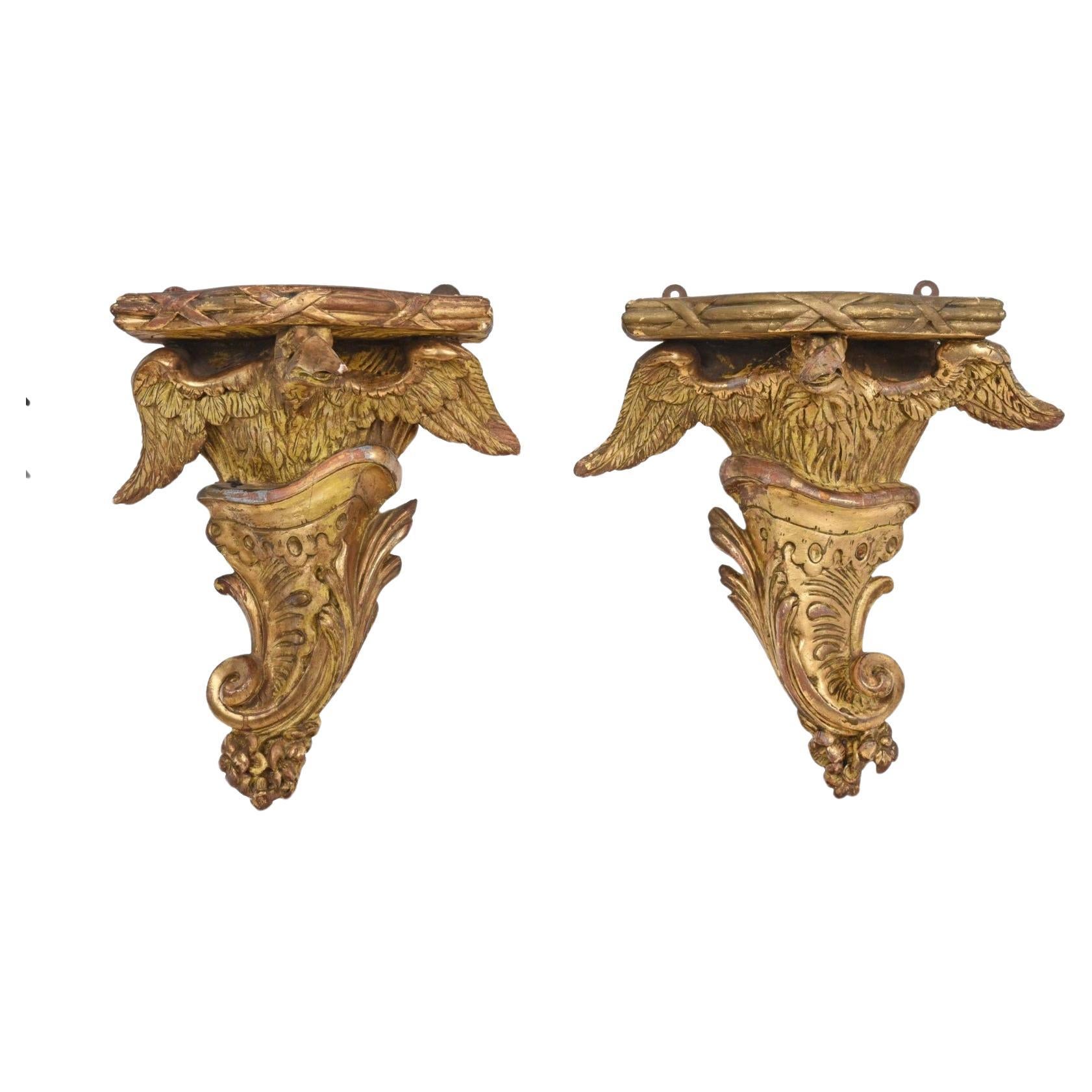 XIXe siècle Paire de supports muraux en bois doré de style Régence en vente