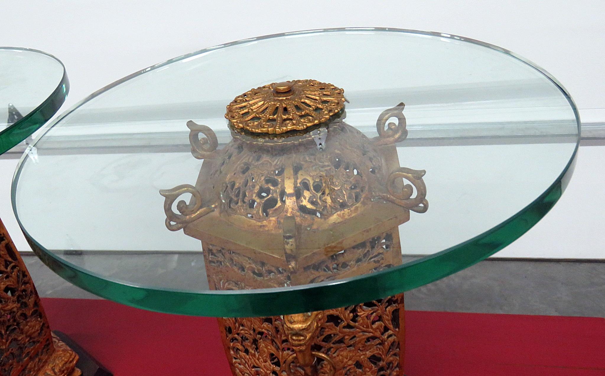 Pair of Regency style glass top end tables with bronze centers on wood bases with 3/4